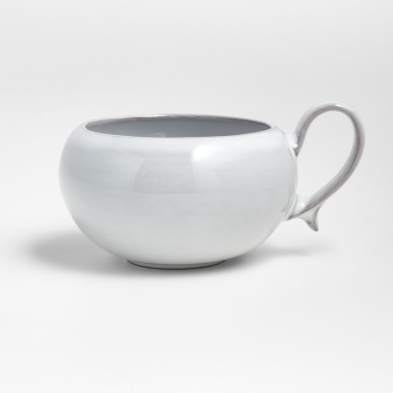 Lira White Porcelain Footed Mug | Crate and Barrel | Crate & Barrel