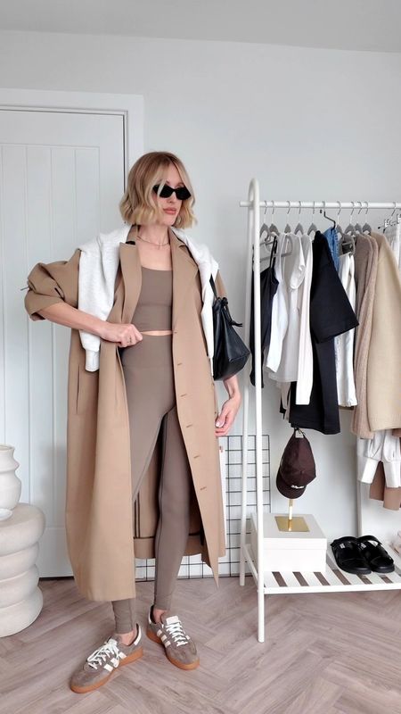 Spring trench coat outfit styled with gym leggings and bra - all items from my recent spring capsule wardrobe collection.• toteme trench coat eu 36- true to size • adanola Leggings size small (tall length I'm 5 ft 8)• gym bra size medium (size up if larger bust, I did and I'm a 32 D)#trenchcoat #springoutfit #capsulewardrobe 

#LTKstyletip #LTKSeasonal #LTKeurope