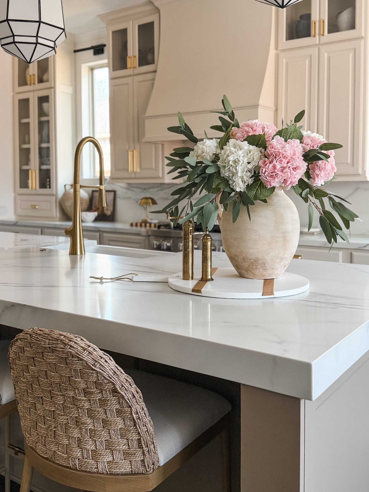 These are hands down the most realistic hydrangeas I’ve ever styled 🌿 The soft, weathered tones paired with a collected-looking vase and a beautiful cutting board make the prettiest seasonal arrangement. Effortless, timeless, and zero maintenance—this little corner feels so elevated for spring and beyond.


real touch hydrangeas, realistic faux flowers, spring floral arrangement, modern organic home decor, neutral home styling, weathered vase decor, cutting board styling, kitchen counter decor, coffee table styling ideas, timeless home decor, neutral florals, studio mcgee inspired decor, amber interiors style, elevated everyday decor, spring home refresh

#LTKHome