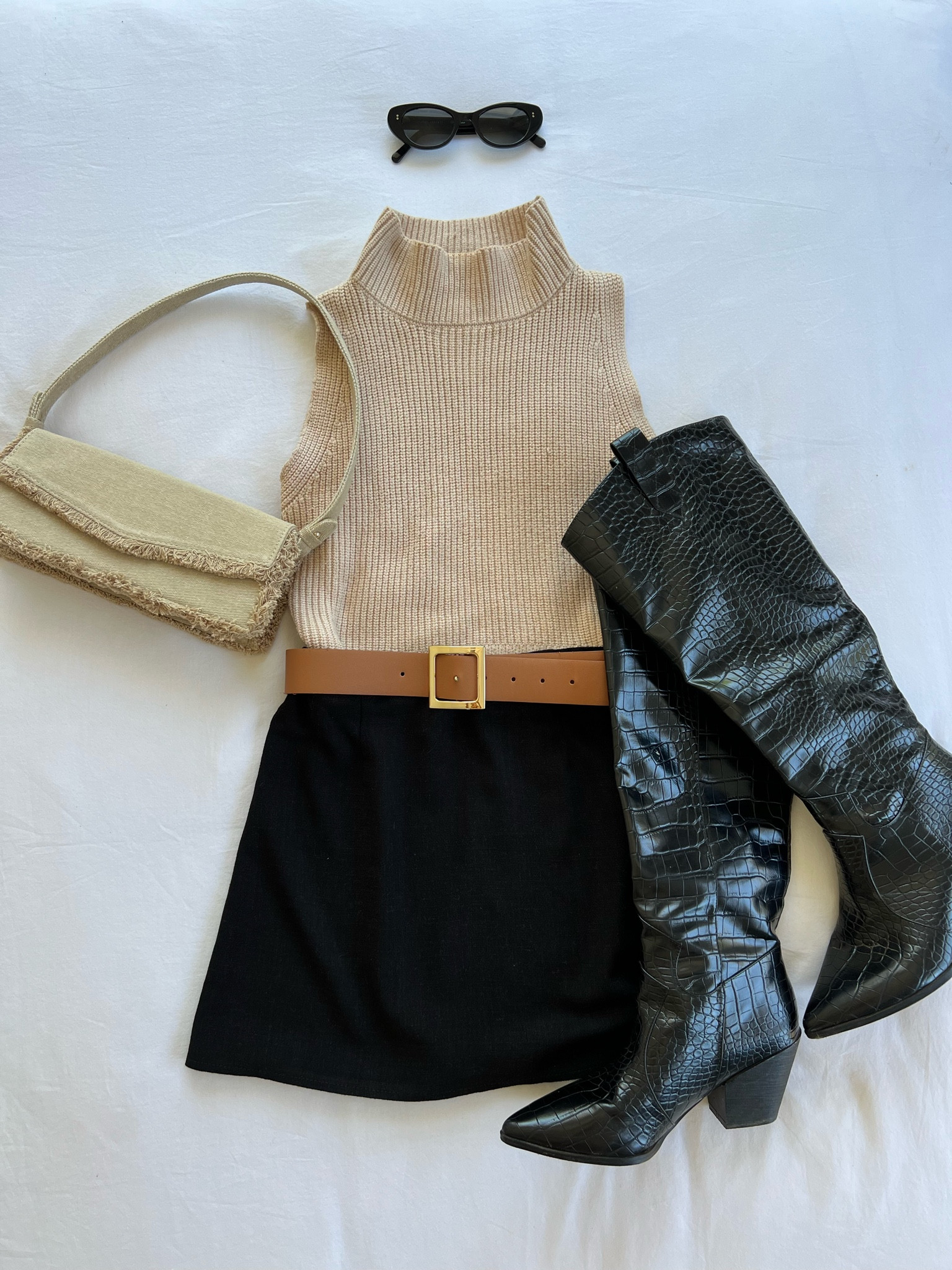 Spring going out fit 🥂 top from charcoal clothing, black mini skirt, knee high boots, zara frilled bag, old princess polly belt 