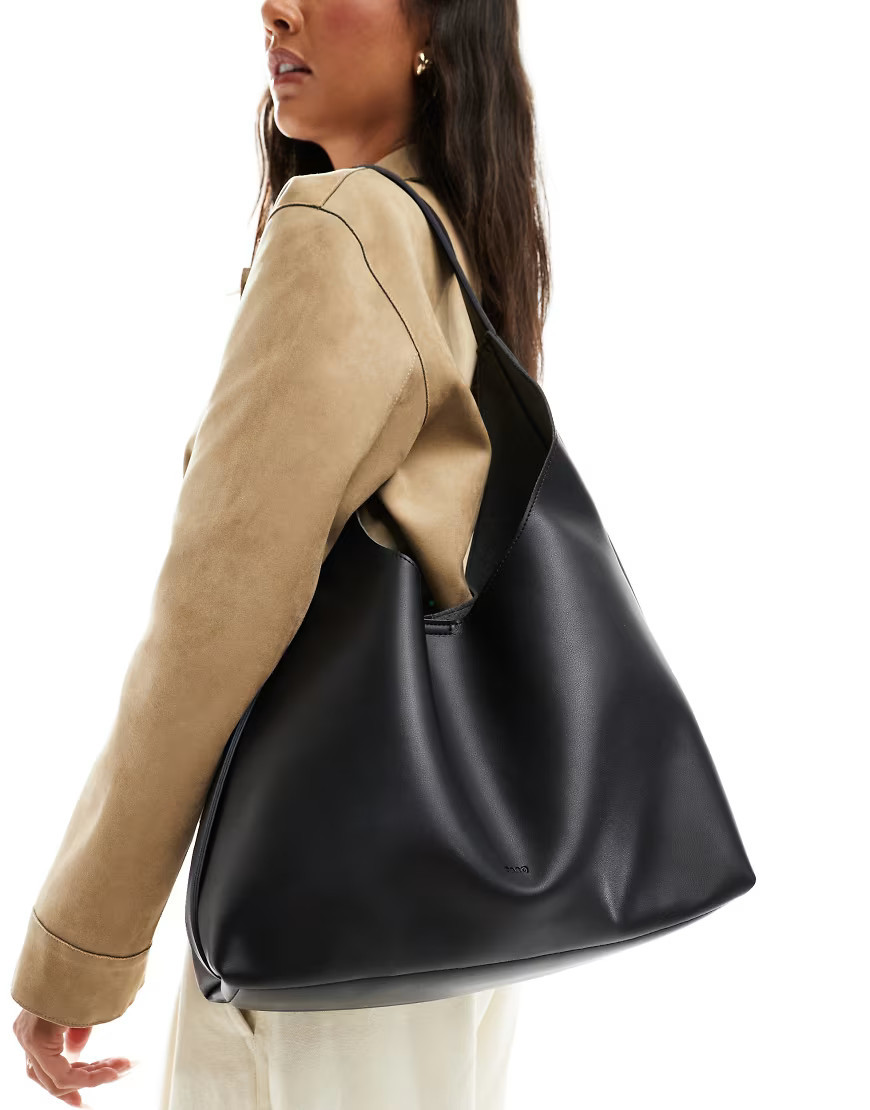 PASQ soft slouchy shoulder bag with strap detail in black | ASOS (Global)
