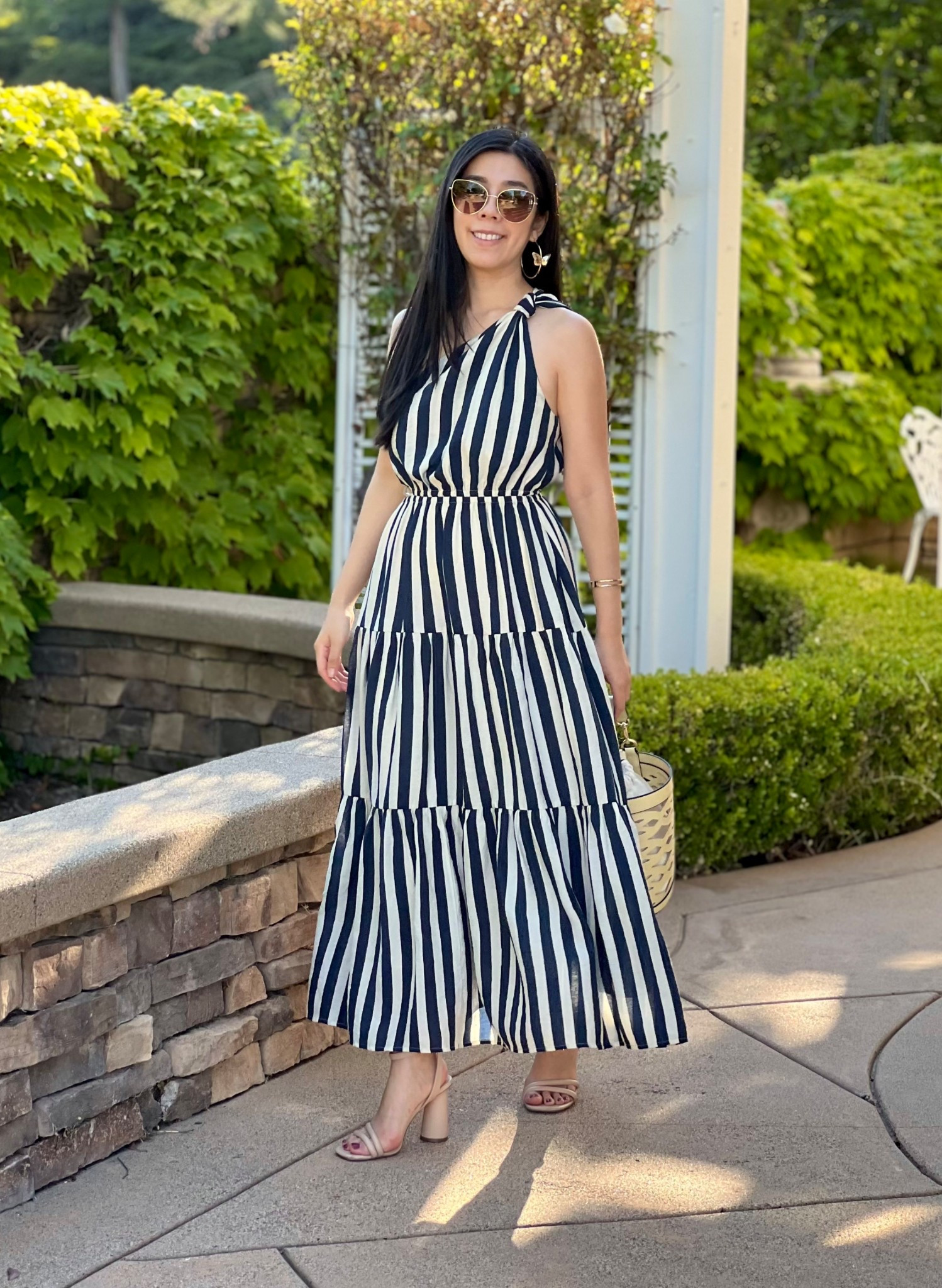 The perfect summer striped maxi dress with a little peek-a-boo slit on the hip! #maxidress #stripeddress #summerstyle

#LTKPetite #LTKItBag #LTKShoeCrush