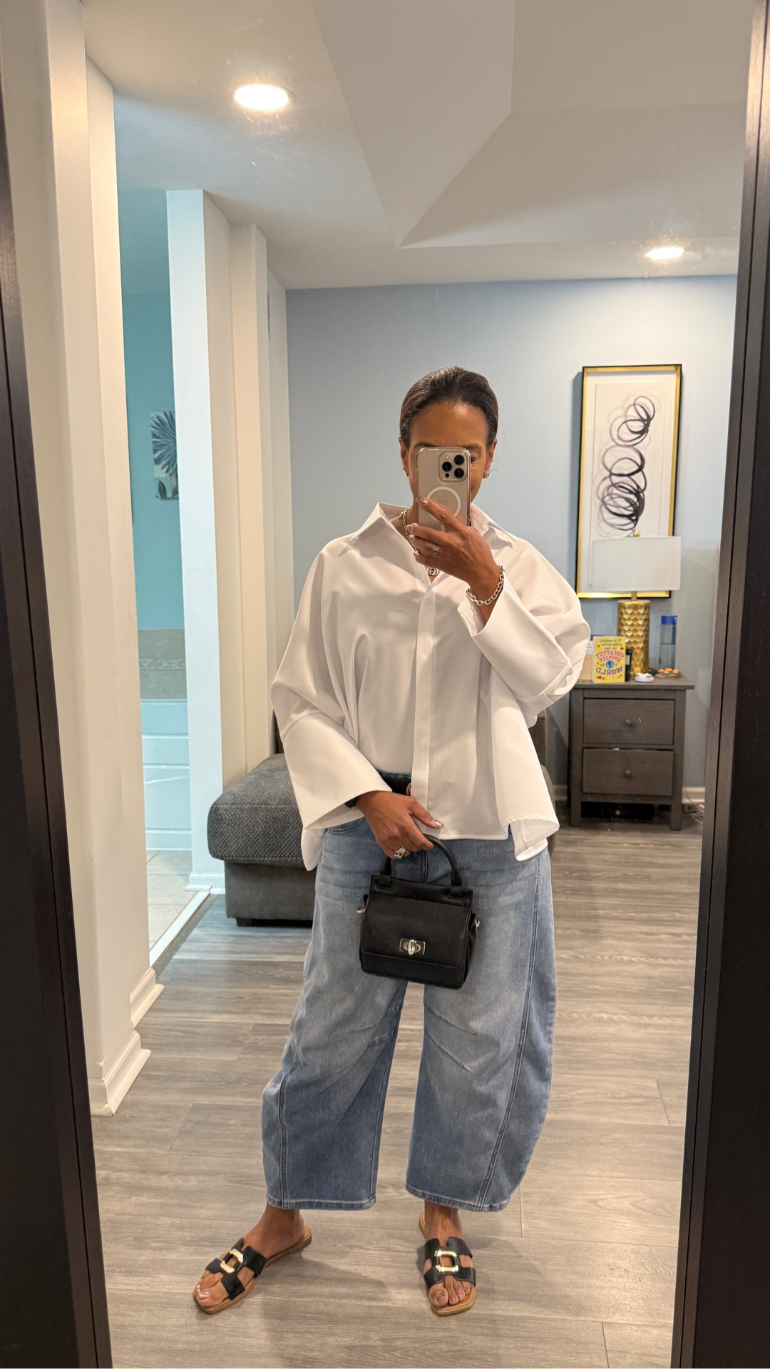 Spring time. Oversized white blouse and Walmart cute black purse find 

#LTKSpringSale #LTKdayinmylife #LTKgrwm