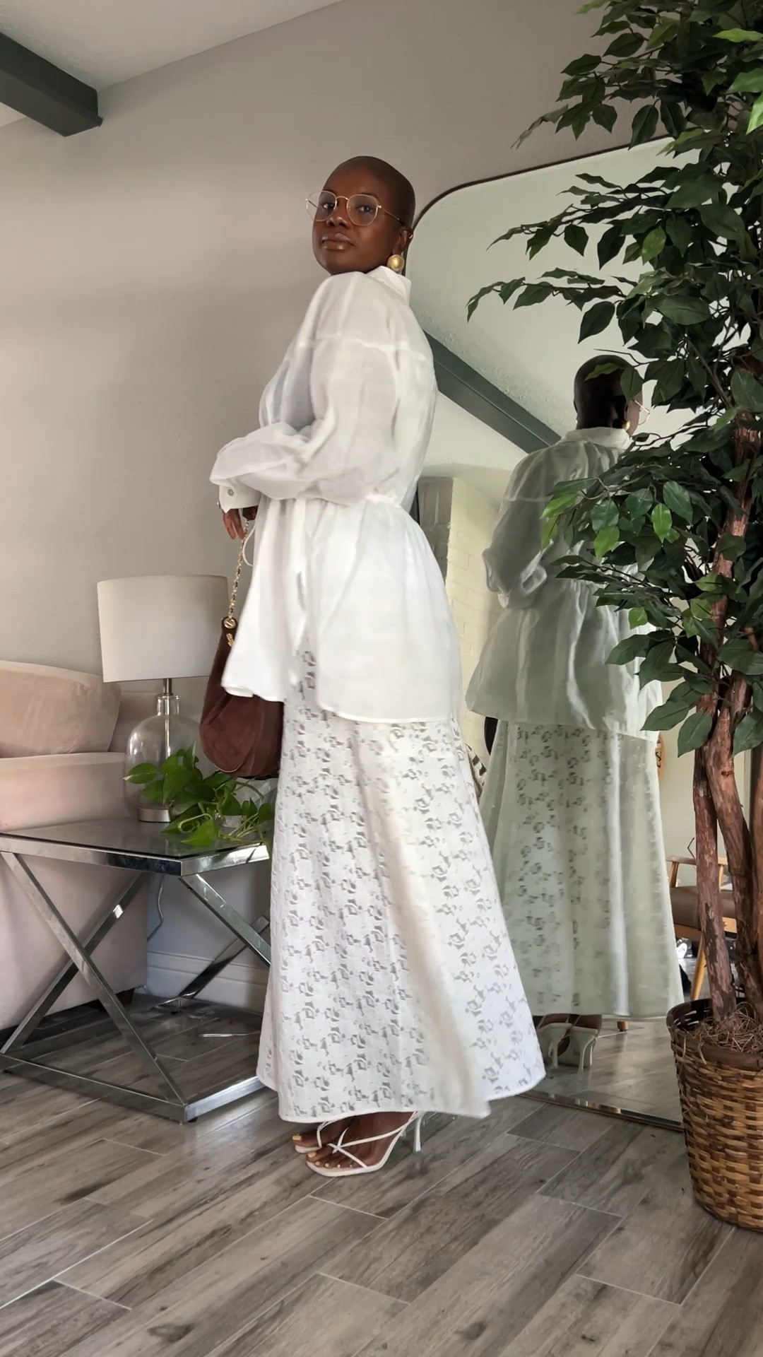 Transitional fall outfit I styled for LTK Con! White lace maxi skirt, white oversized white linen long sleeve shirt with front tie, brown suede crescent purse, white strappy heels and gold metal frame blue light glasses. 

#LTKWorkwear #LTKSeasonal