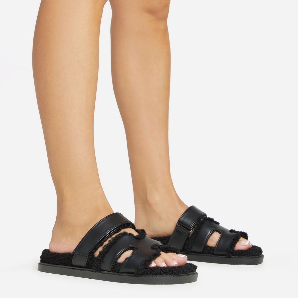 Shonya Faux Shearling Insole Gladiator Velcro Strap Flat Slider Sandal In Black Faux Leather | EGO (UK)