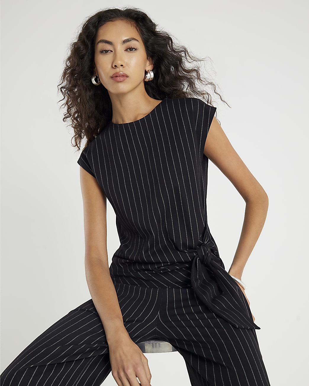 Black Pinstripe Sleeveless Tie Waist Top | River Island UK & IE