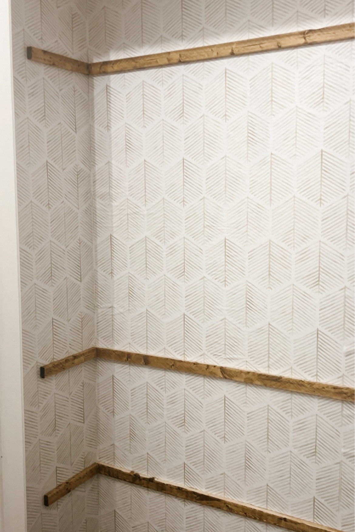 Wallpaper and supports in the coat closet are up! For $8 a roll, this wallpaper really impressed me! 

#LTKVideo #LTKFindsUnder50 #LTKHome