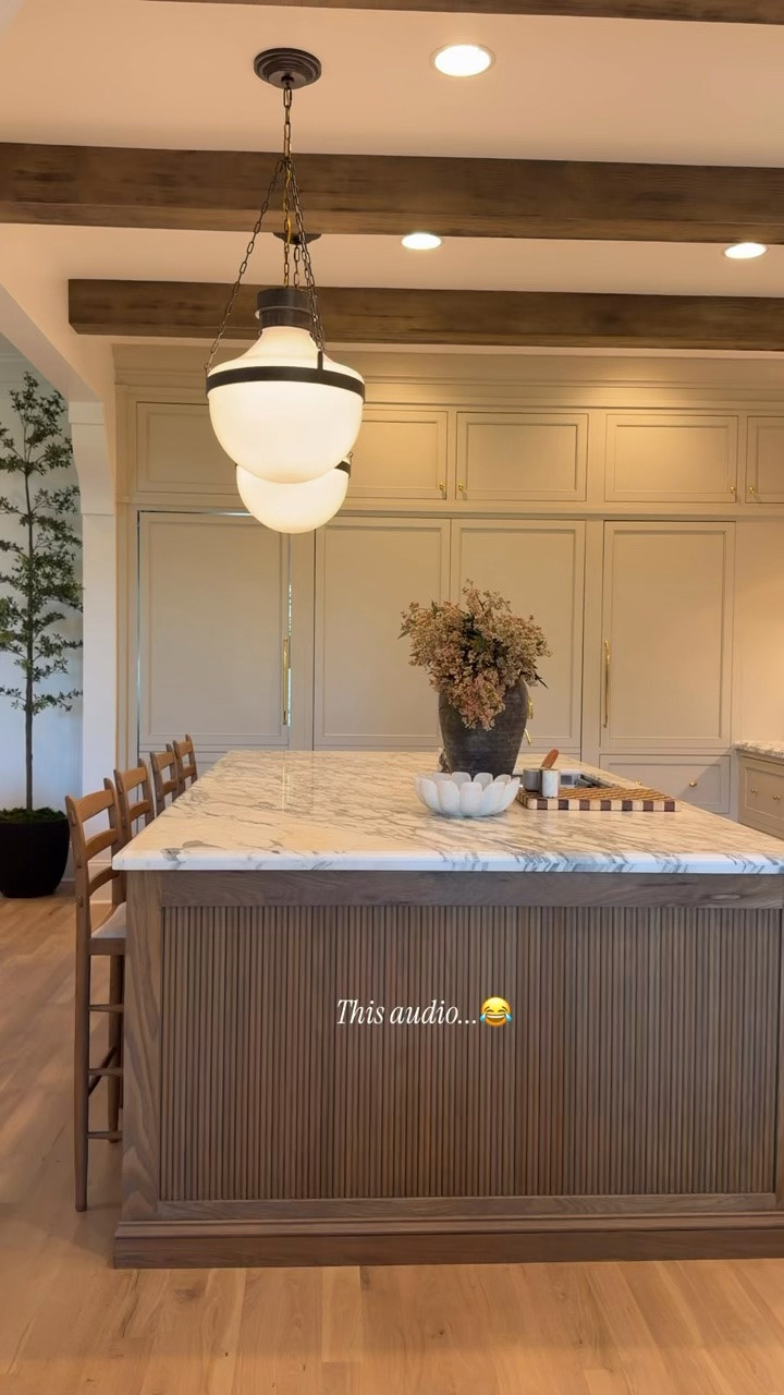 This audio 😂 All jokes aside, Jeff and I couldn't be happier with how our dream kitchen turned out. I had so many different inspiration photos saved on my Pinterest board 😅, spent months searching for the perfect honed marble with Tracy, countless hours designing this exact range hood with Jeff (we wanted an oversized bell shaped hood so we can mount a marble piece to the bottom portion),  unlacquered  brass hardware, & lighting (not an easy task when there's so many to pick from) I am super picky and wanted very specific  timeless pieces , panel ready appliances and dream range, paint & island stain color (we tested so many different color variations just to find the perfect one ). 

Months later and it 💯 complete. We couldn't have done it without Mike & Tracy. They help us execute our visions. Their experience in Luxury Home Build is next level 🙌🏼. We are a dream team (still  have no idea how we convinced them to take on our home remodel. None.  😂). Not only did we get a dream kitchen we all became best friends through it all which is priceless. 🤍 We are very blessed 🥲