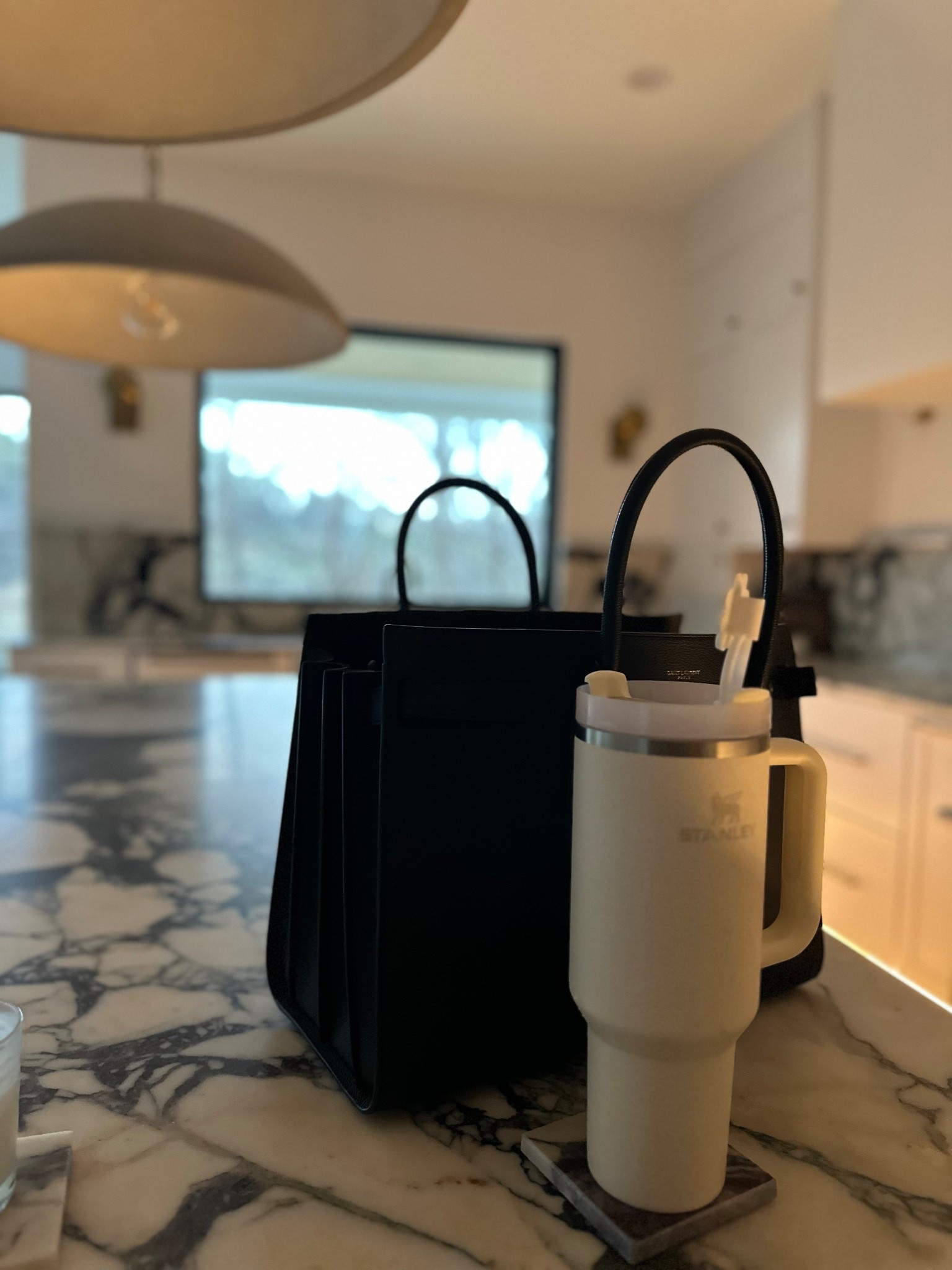 Office work bag and my go to Stanley cup

Glimpse of my home featuring lights from Visual comfortt

#LTKFindsUnder50 #LTKWorkwear #LTKHome