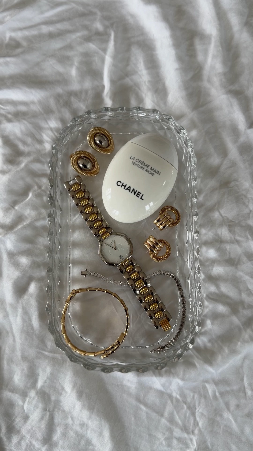 I linked a similar Crystal tray to mine along with some similar jewelry. Gold earrings, diamond look, tennis bracelet. Chanel hand cream.

#LTKSaleAlert #LTKHome