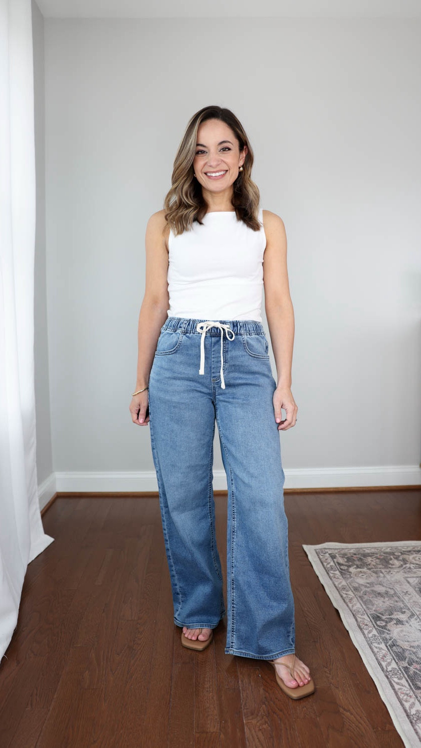 Three Petite-friendly pairs of drawstring jeans for spring and summer! 

J.Crew Factory Petite Drawstring Jeans: Petite 24 | 10" rise | 27" inseam | true to size 

Of the two J.Crew Factory options these would be the one I would pick. They fit better overall and I like that they don’t have large pockets in the front. 

Tank Top (Quince): XS 

Sandals (Tkees): True to size

My sizing for reference: I'm 4'10" and weigh 105lbs. My measurements are 32", 24", 36". I have a 25" ankle inseam and typically wear petite xxs/00/24. 

#LTKPetite