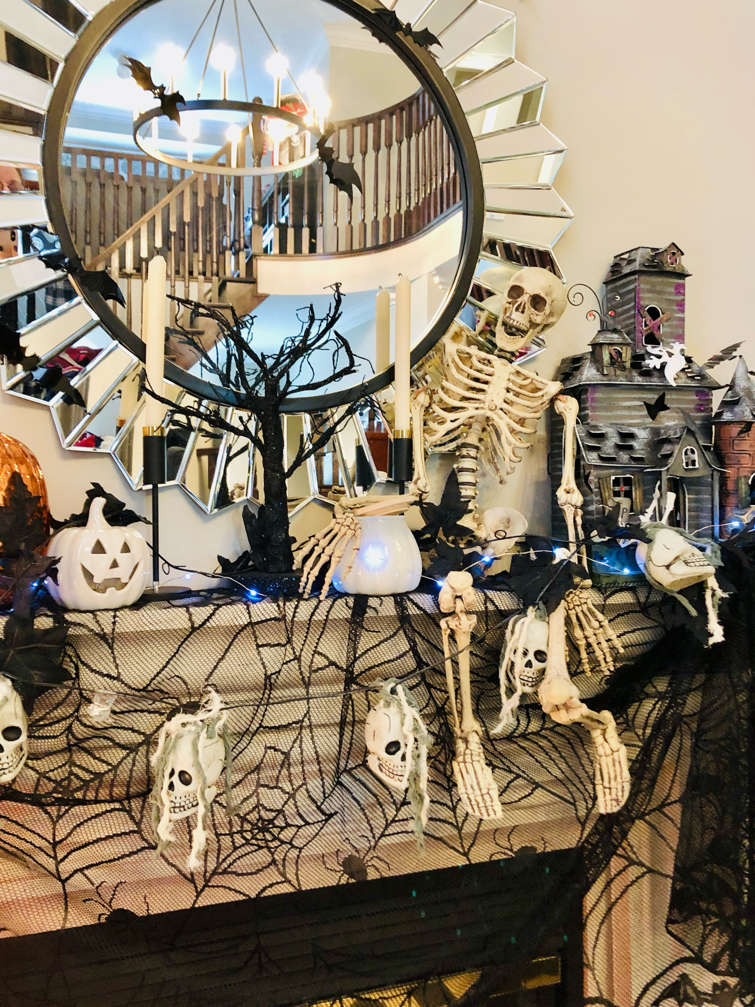 Styling a fireplace mantle for Halloween 

#LTKSeasonal #LTKHome #LTKFallSale