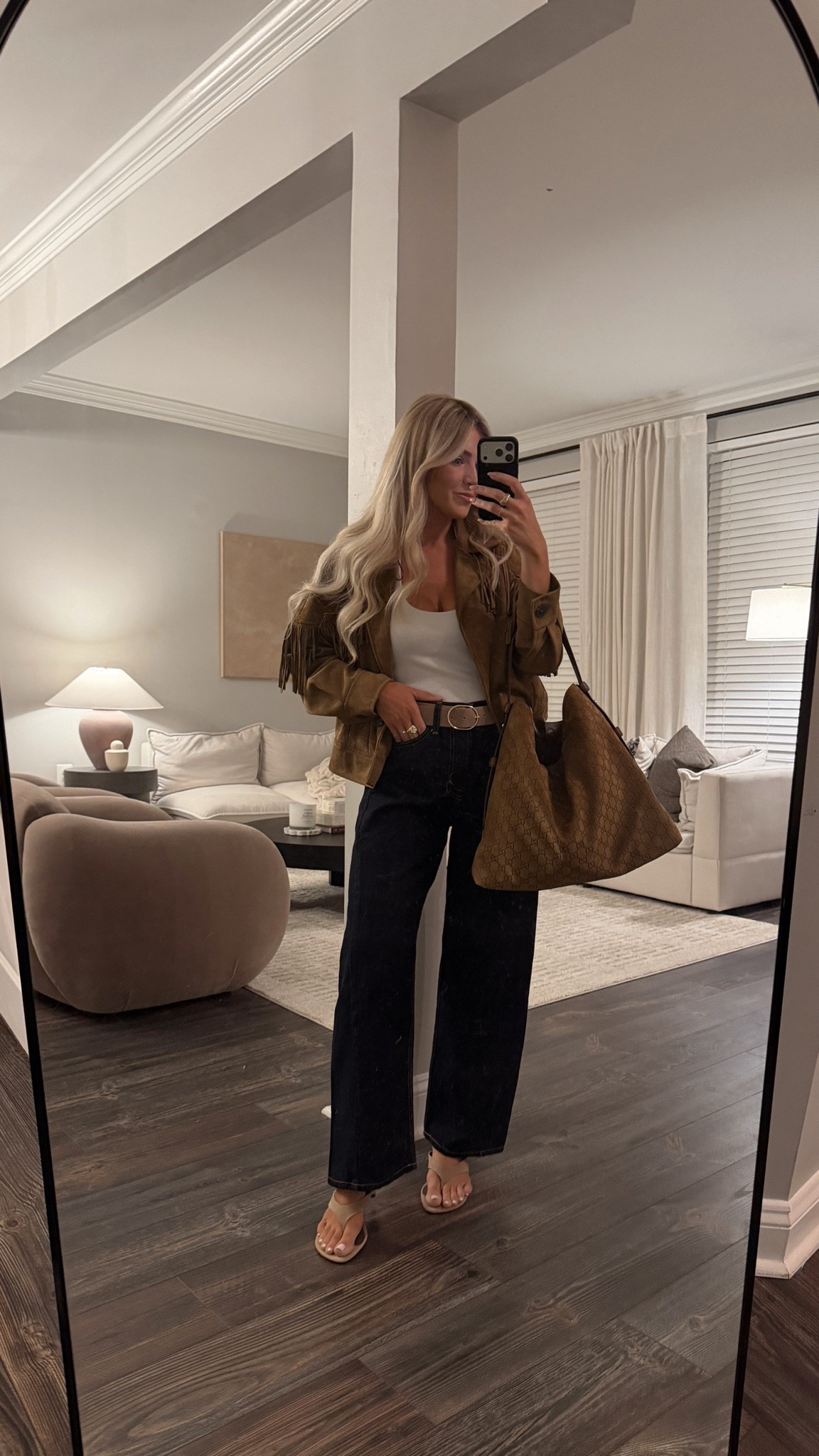 Travel ootd! Unreal how much wear I’ve gotten out of this under $20 halter top. Wearing a jacket for the train and will take off when I get there!

#LTKSeasonal #LTKNYFW #LTKootd