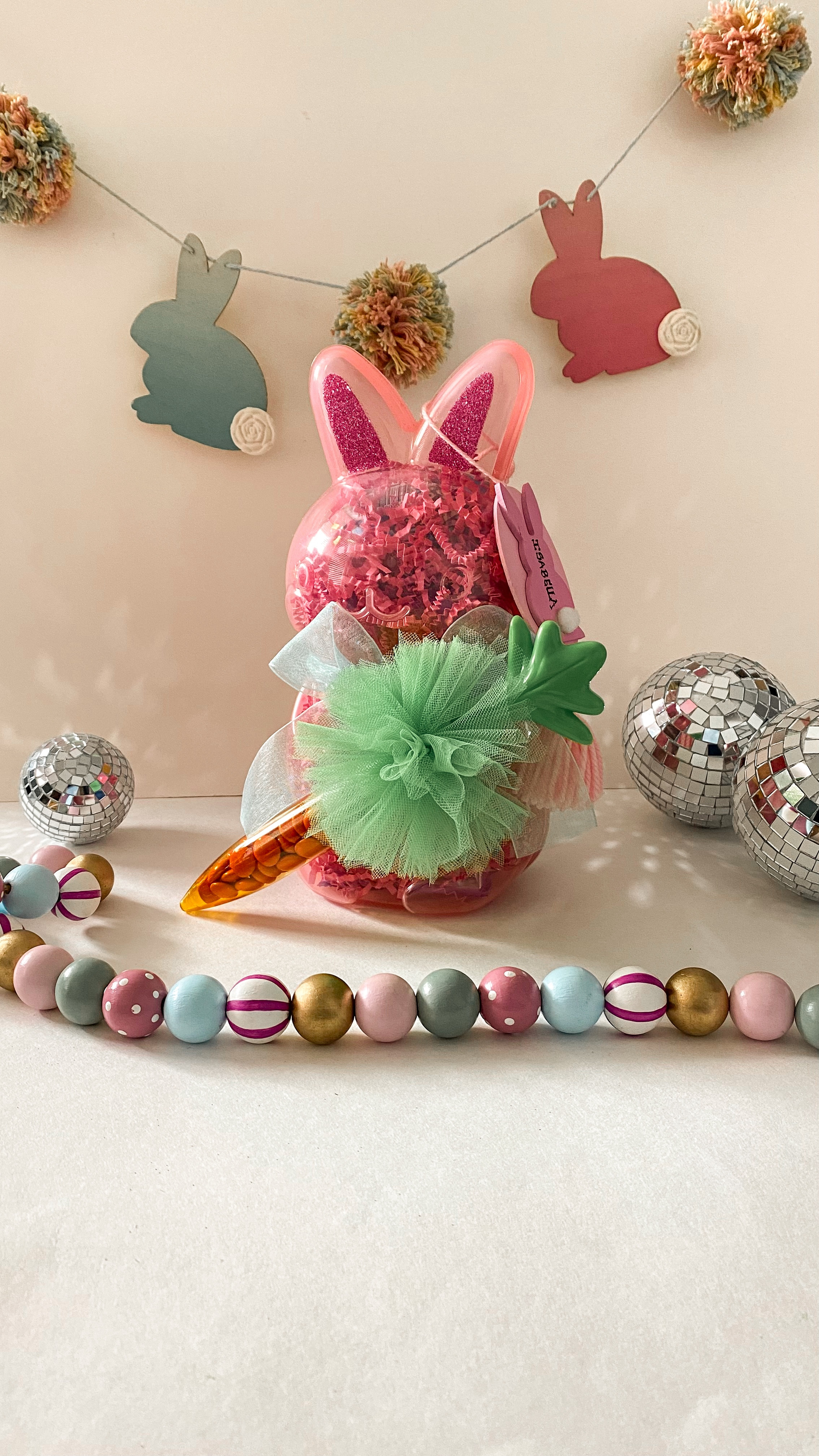 Easter Gift Idea 🐰
Surprise your loved ones this Easter with an adorable bunny-shaped treat filled with sweets, decorated with a tulle bow and chic details. Perfect for a charming Easter aesthetic! 🌸🎀🐰

#LTKKids #LTKSeasonal #LTKSpringSale