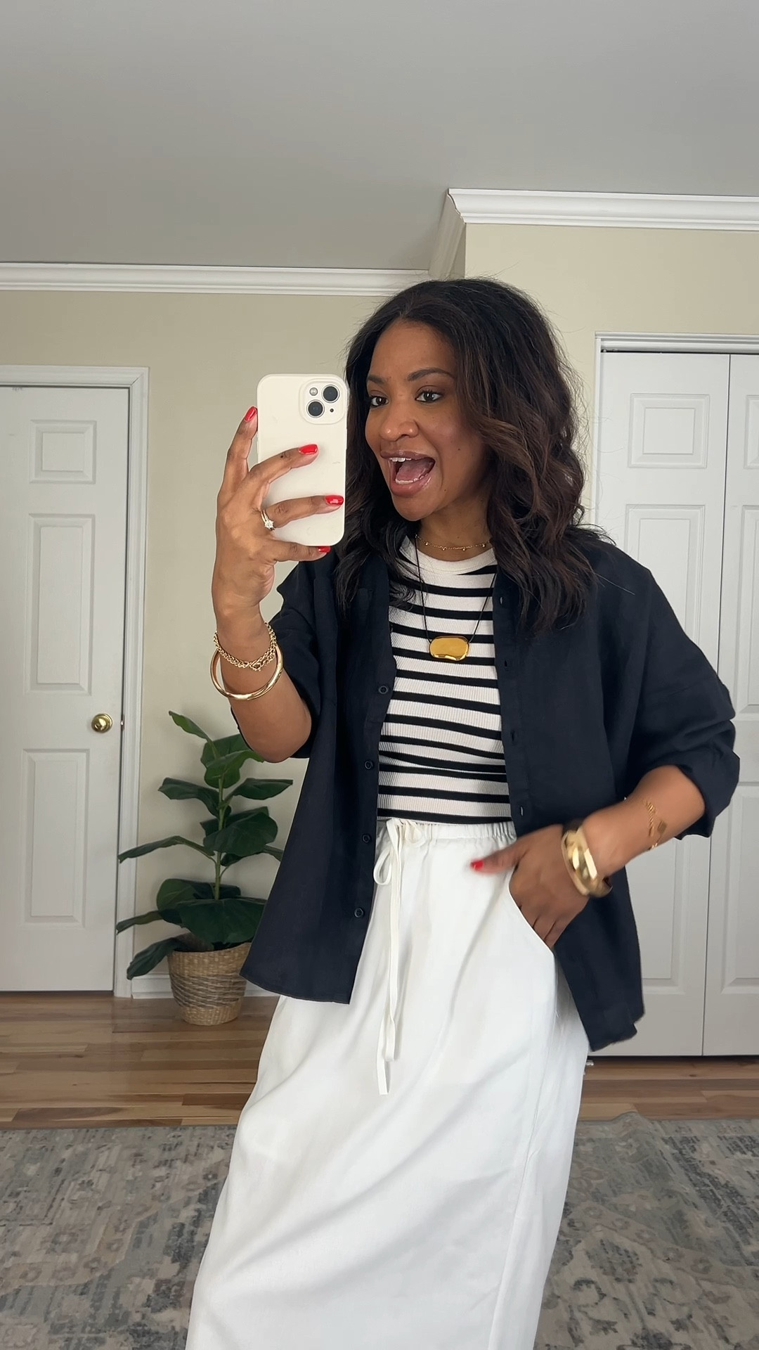 Wearing a medium and the black button down. Wearing a small and the striped tank top. Wearing a small and the skirt. The skirt runs kind of big so I probably could’ve sized down to an extra small. True to size in the sandals.

#LTKootd #LTKOver40 #LTKgrwm