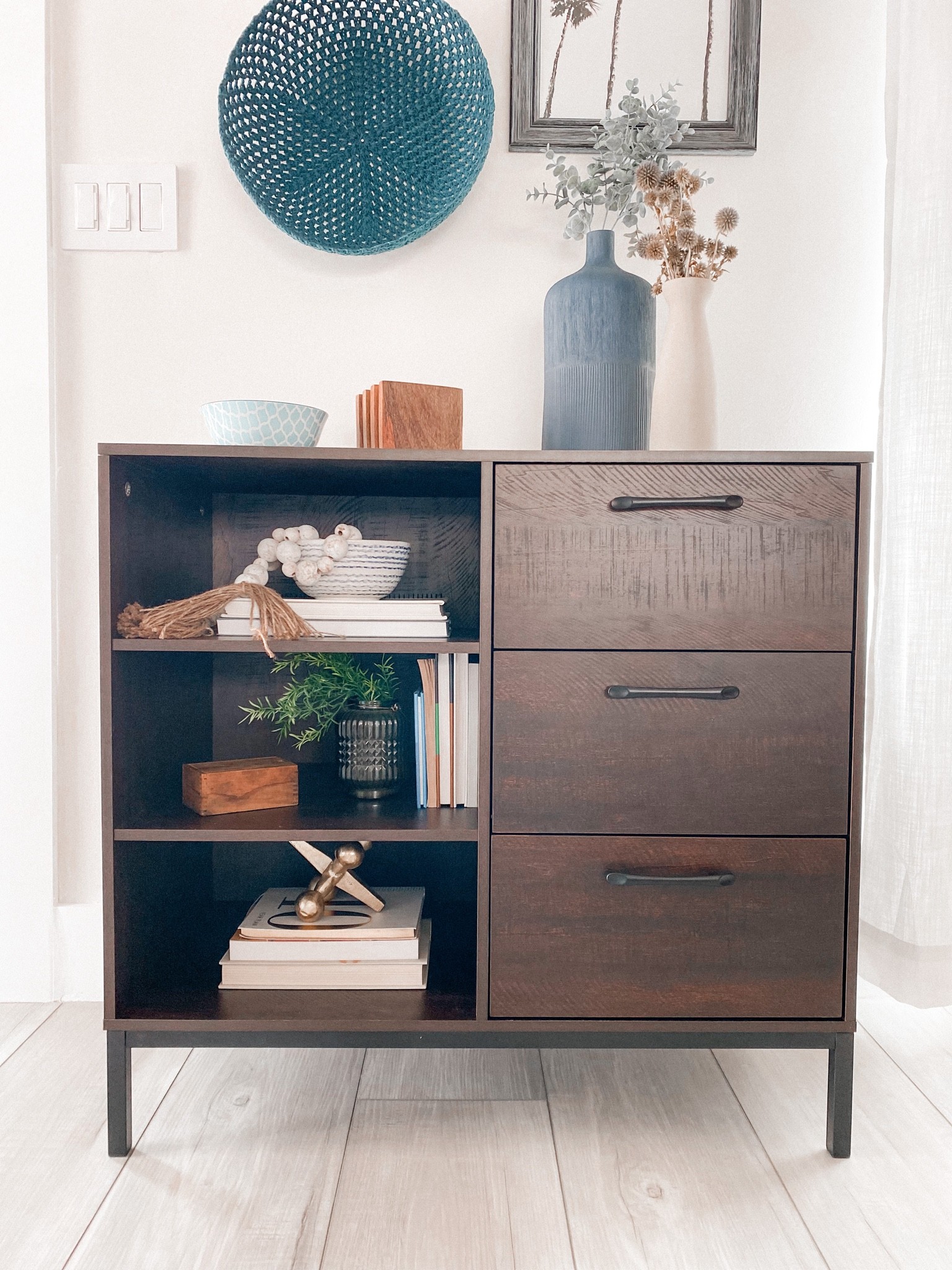 A super affordable entryway cabinet! I love the open shelving for decor but also the drawers to hide all the things! 

#LTKfamily #LTKhome #LTKunder100