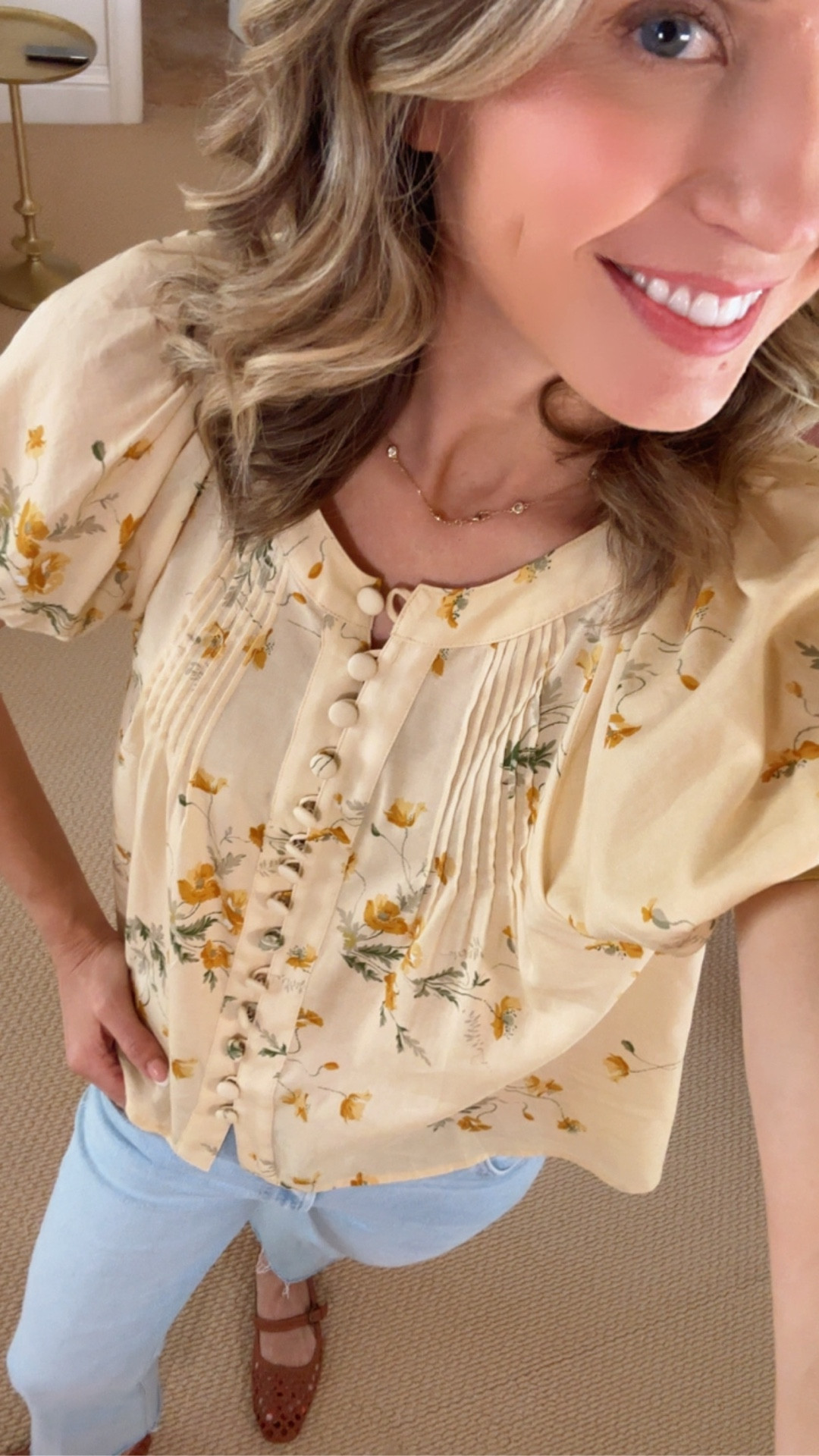 Pretty yellow spring blouse. Love these light blue mother jeans for spring! Wearing xs top and petite 25 jeans
