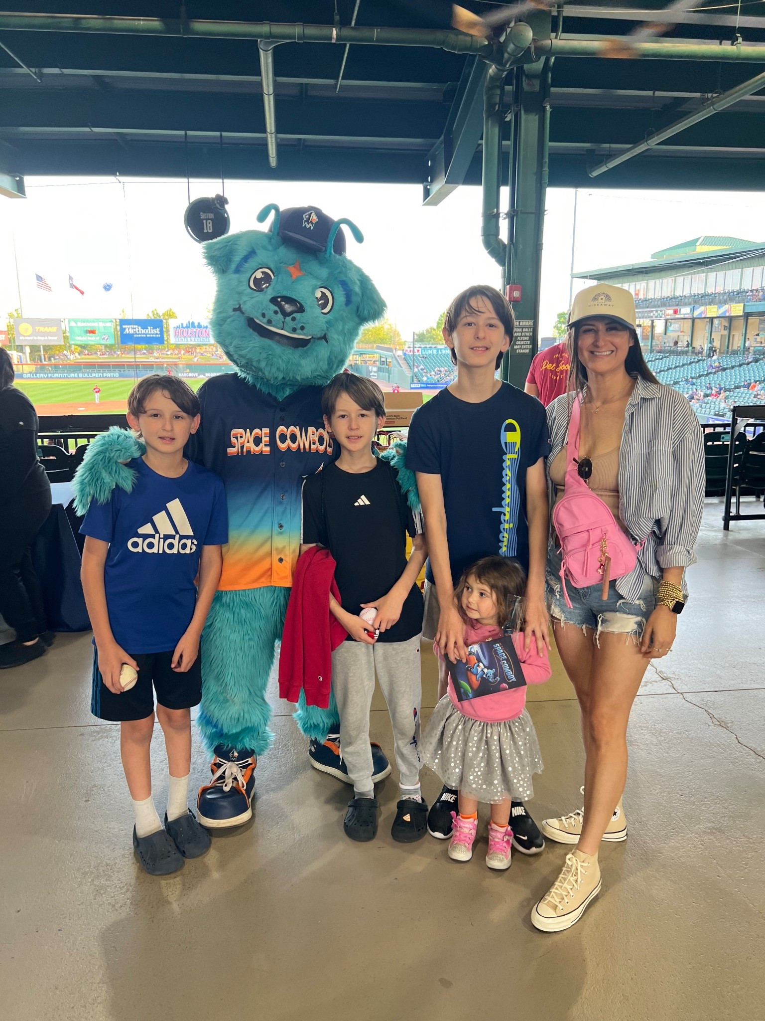 Baseball game outfit. Went to see our local minor league team for a family outing. Wore a top with a built in bra and an oversized button down tee with some shorts and of course chucks.

#LTKmomlife #LTKootd #LTKdayinmylife