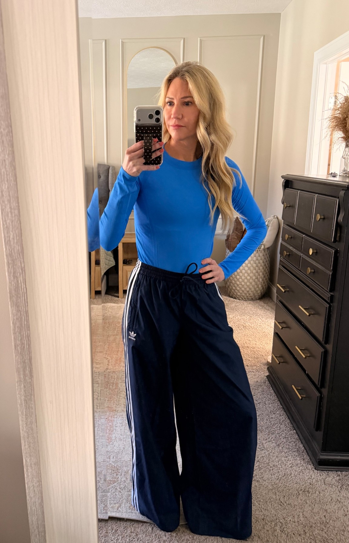 Every day, casual outfit, the most perfect every day yoga top. It is so soft and an Amazon favorite that I want to wear on repeat! Paired with Adidas wide leg pants for a comfortable look.

#LTKOver40 #LTKootd #LTKActive
