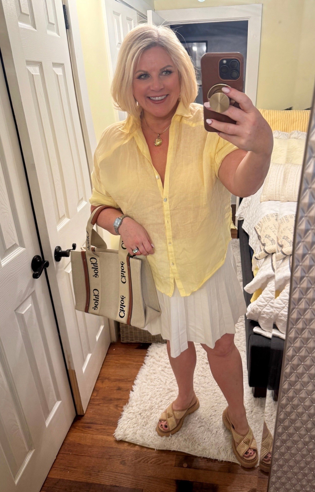 All of the pumpkins, back to school sales and fall outfits in the stores can change the fact that it's 90+ degrees, with humidity straight out of the tropics.
This was my out and about outfit for today. A light weight linen shirt and tennis skirt with my beloved raffia summer sandals.
Over 40 summer outfits. Beach vacation outfit, tote, summer clothes, Prada , Chloe

#LTKdayinmylife #LTKootd #LTKOver40