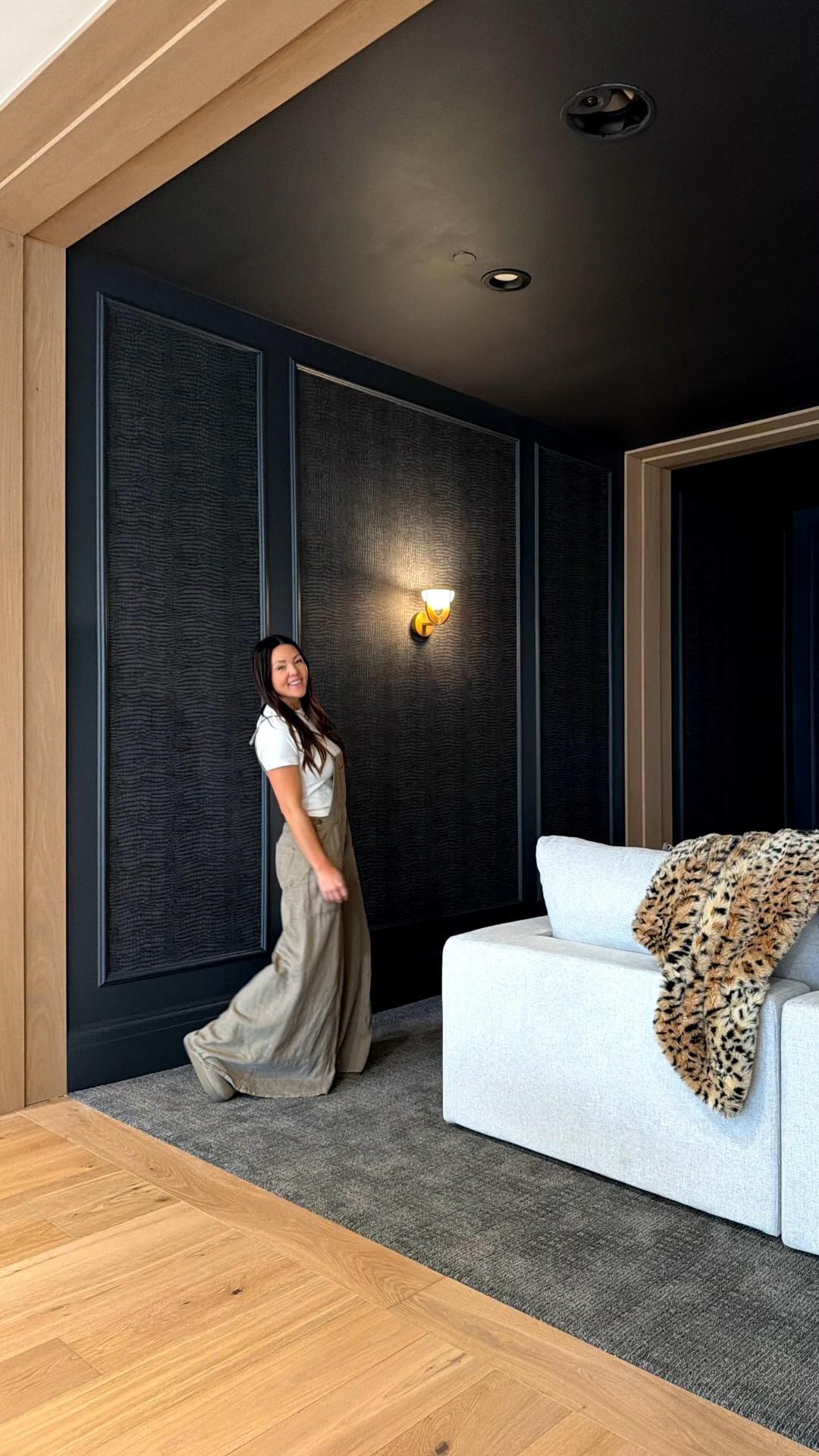 DIY home theater media room.
Dark vibe with tone on tone animal print, deep modular sofas, and lots of wall trim. 

Modular sofas in heather gray and slate fabrics. 

#LTKHome #LTKdayinmylife #LTKSaleAlert