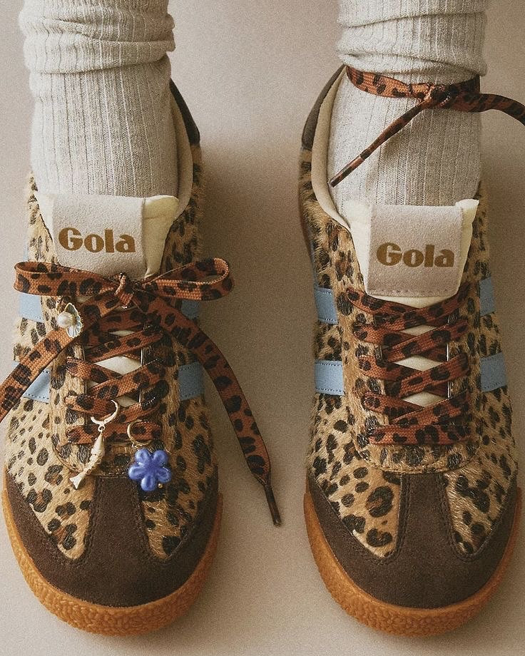 Leopard Sneakers, but Make It Chic! 🐆💙

These Gola leopard sneakers are pure magic - bold, playful, and effortlessly cool! The mix of cheetah print, soft blue stripes, and chunky gum soles makes them the perfect statement piece for any outfit. And let’s not forget the charmed laces - because details matter!

Pair them with slouchy jeans and a cozy sweater for the ultimate off-duty look. Would you wear them? 
.
.
.
Pinterest inspired, mood board aesthetic, fashion inspo, daily outfits, explore fashion #sneakers #springfashion #springstyles #outfitinspo

#LTKShoeCrush #LTKSpringSale #LTKSeasonal