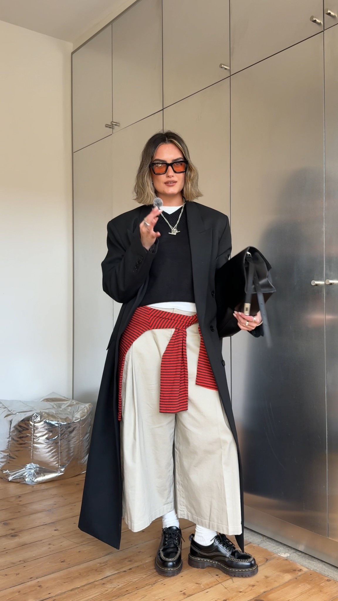 Black coat, black jumper, dr martens, Uniqlo culottes

#LTKspring #LTKuk #LTKFashionMonth