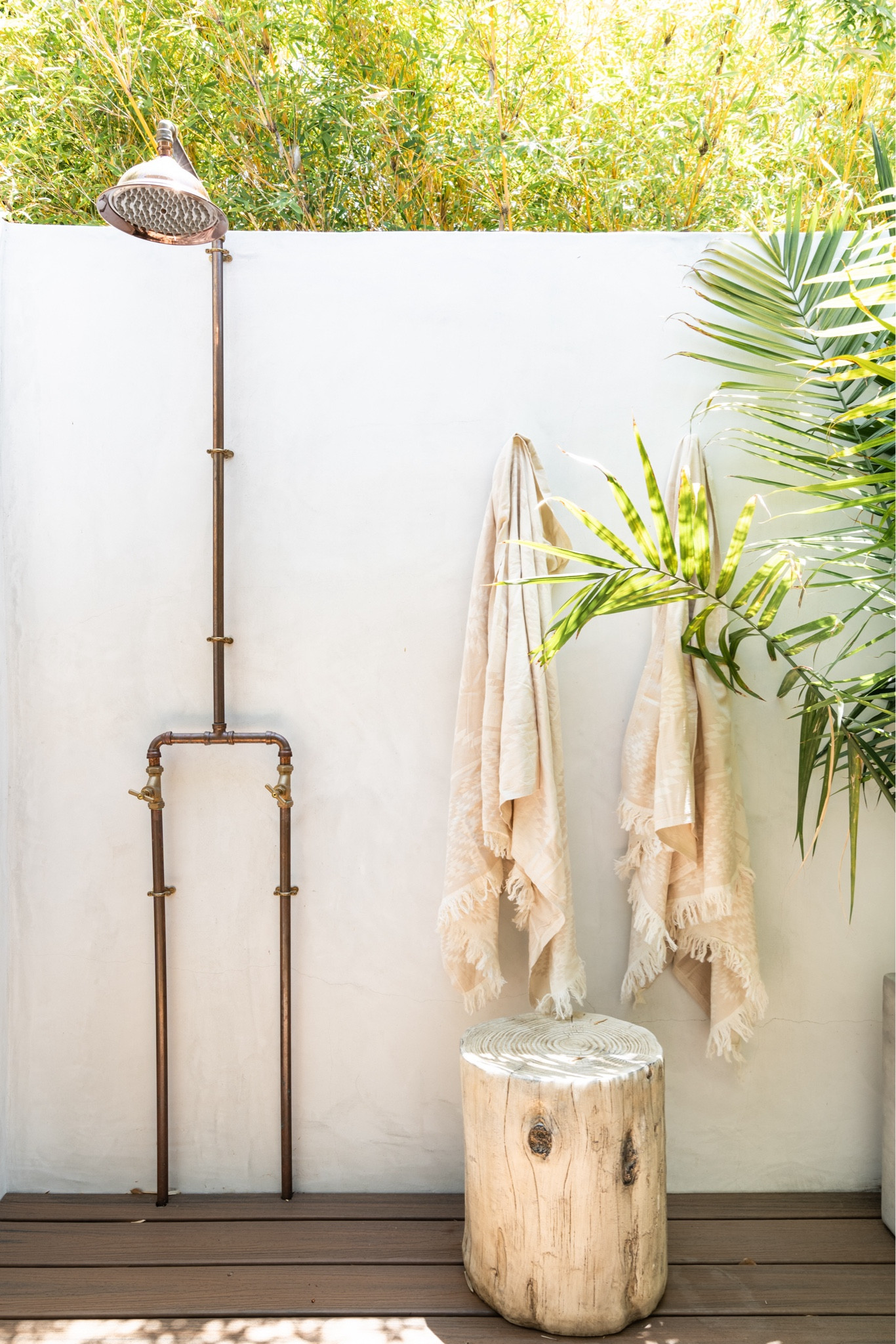 Outdoor Shower Design- we turned an unused side yard into a spa bathroom with an outdoor shower.  We added this stucco wall, a shower head and a trex deck.  

#LTKhome