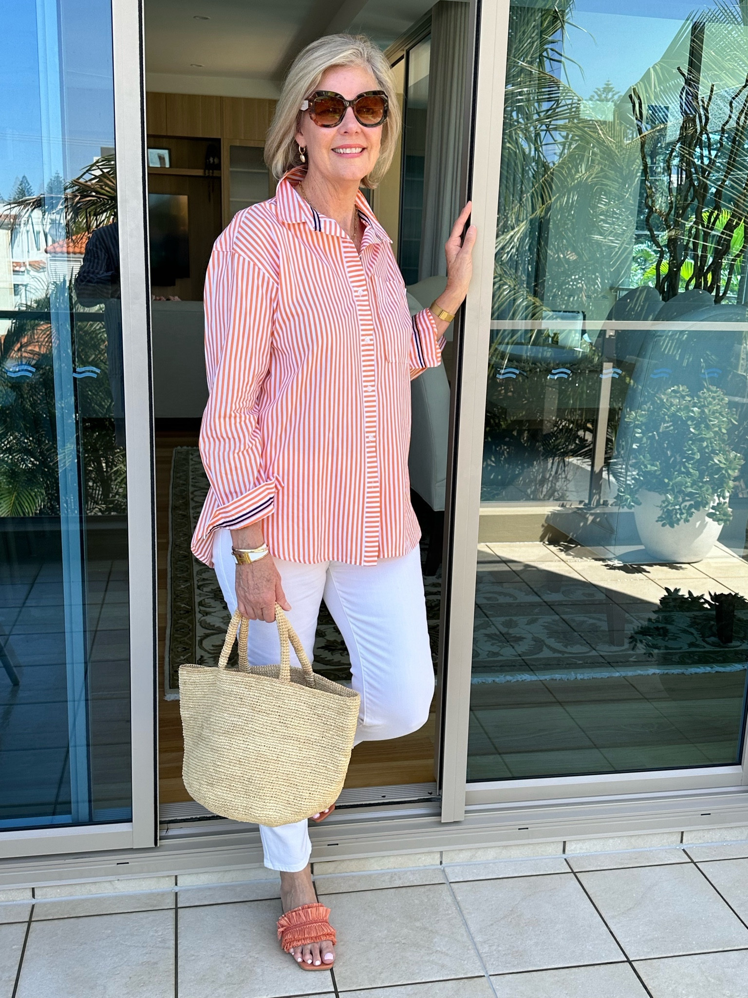 An orange striped shirt with white jeans is always a great idea. So fresh and Summery. Here are some similar styles. 
My perfume is Guggi Flora  
Linda 175cms wears Size 12 jeans and Size 12 shirt. 

#LTKstyletip #LTKaustralia #LTKover50style
