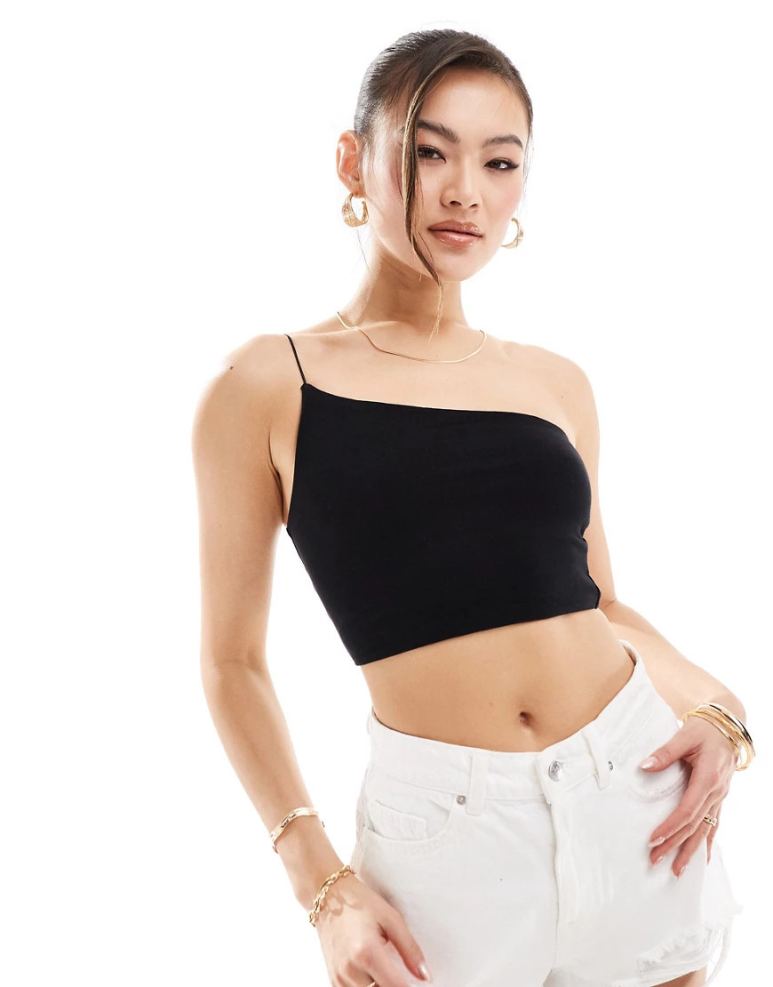 ASOS DESIGN asymmetric neck crop top with skinny strap in black | ASOS (Global)