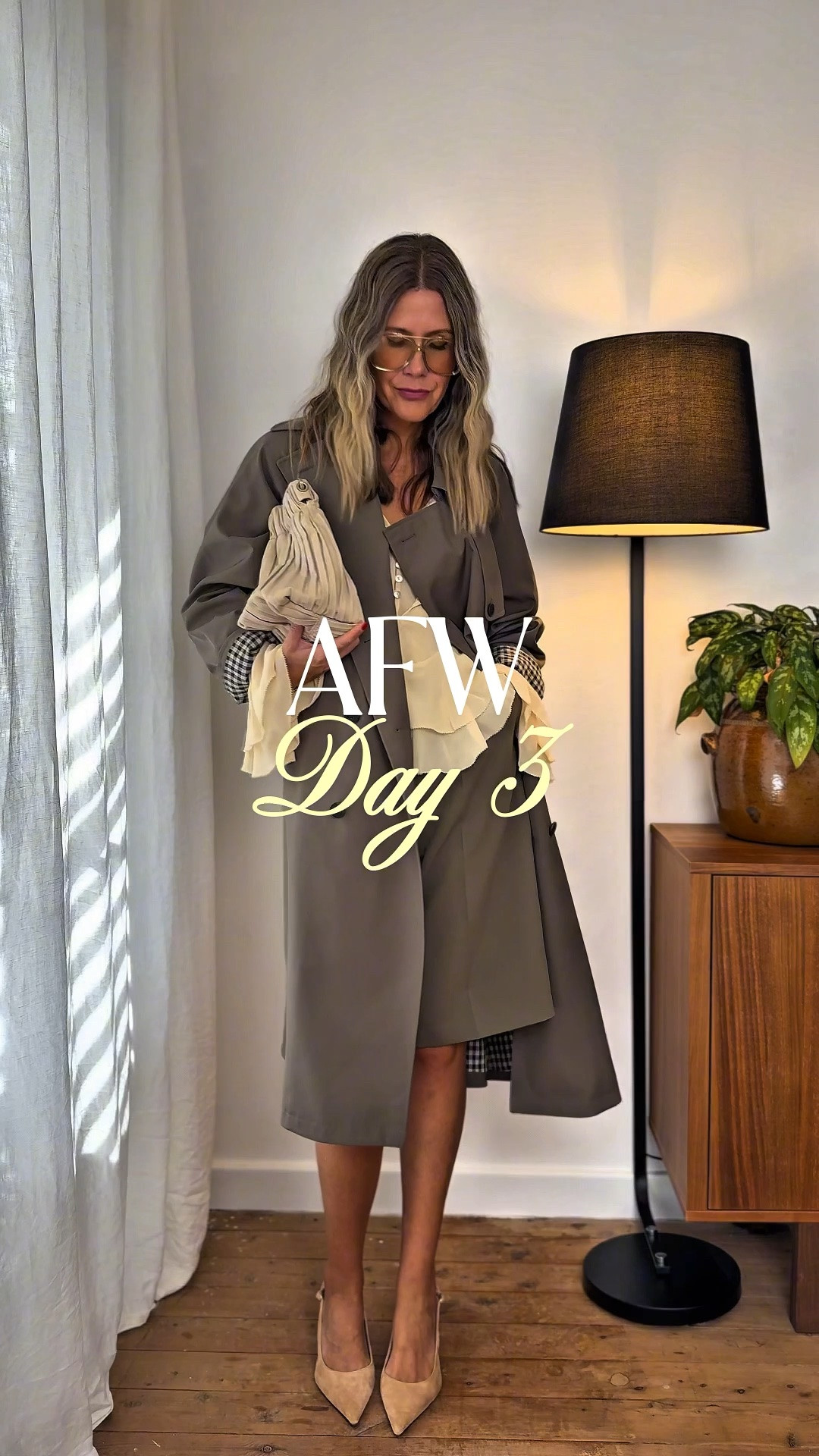 Day 3 of my AFW 2026 series 🖤

Putting the bermuda shorts I wasn't sure about to work — and I'm officially a convert. A frilled sheer top brings the flow, the trench adds structure, and a suede pointed heel finishes it off. Considered without trying too hard.

Day 3 always feels like the sweet spot of fashion week — everyone's settled into their rhythm and the street style is peaking.

Are you still undecided on the Bermuda shorts? 

Wearing a medium in the trench, Small in the shorts, medium in the top x

#LTKaustralia #LTKautumn #LTKwinter