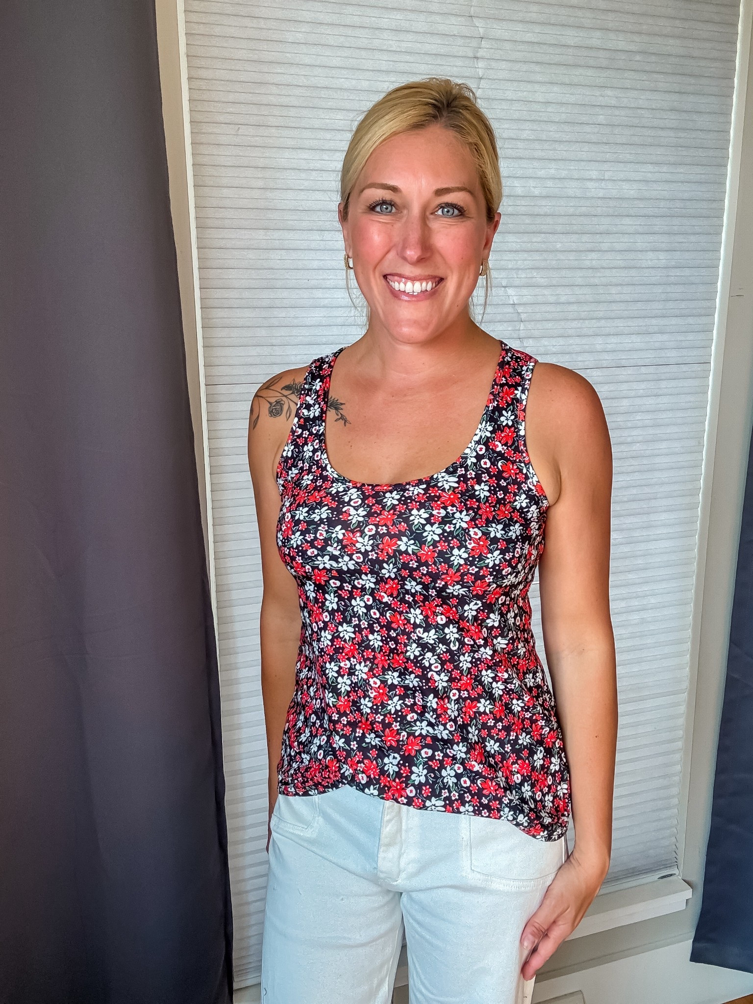 This floral tank top is everything you want for warm-weather style: soft, breathable fabric, a flattering scoop neck, and a loose, flowy fit that keeps you comfy all day long. Perfect on its own or layered under your fave cardigan or blazer — dress it up or keep it casual!

#SummerStyle #FloralFashion #EasyStyle