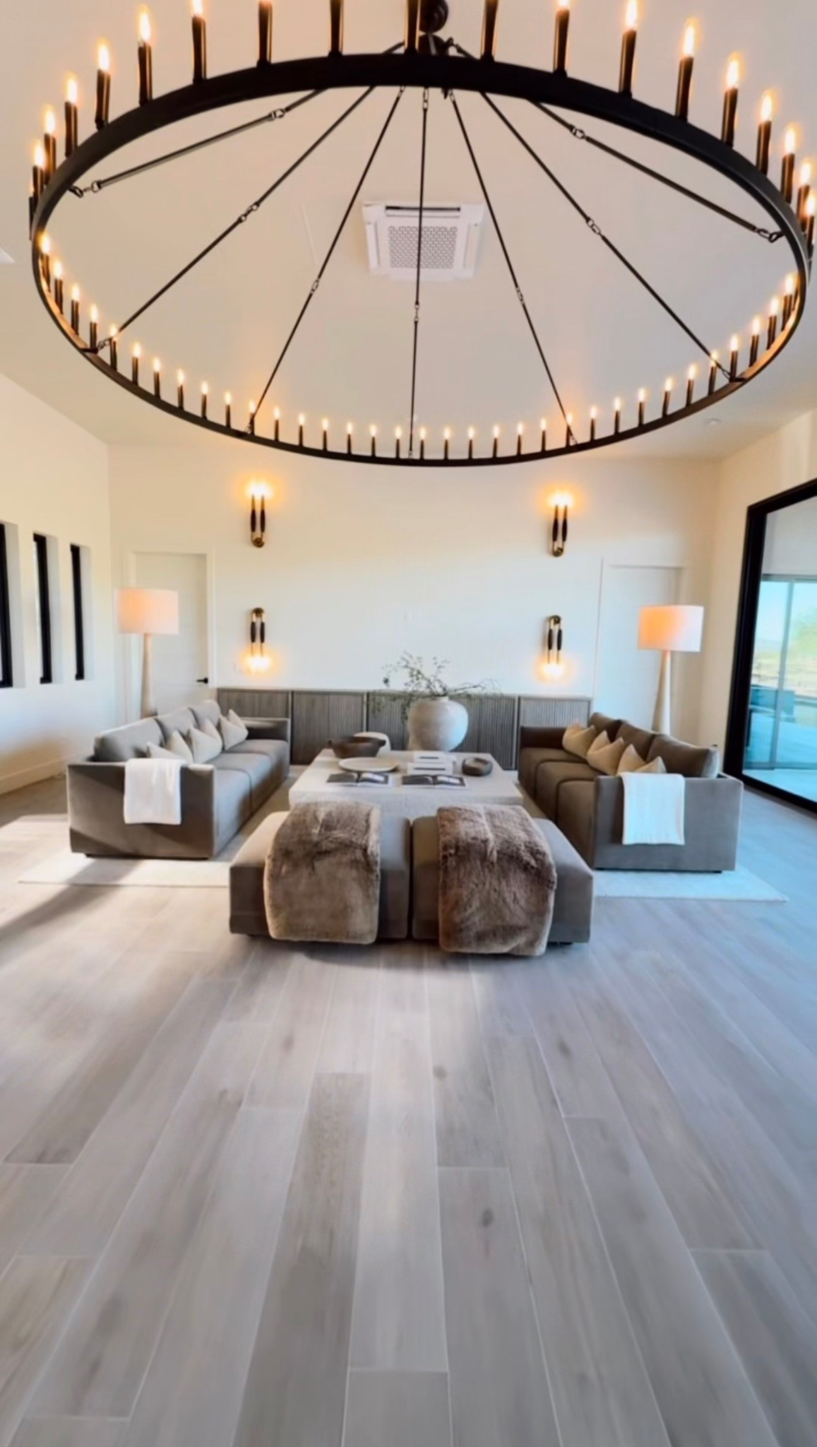 Proof the paint works… and the lighting glow‑up doesn’t hurt either 😉🤎 Color drenching completely transformed this room. Making it brighter, taller, and so much more elevated. It’s wild how a single shade can make a space feel luxe, cohesive, and intentionally designed 🤎✨

Color drenching 
Cozy aesthetic living room 
Loving room design 

#LTKHome