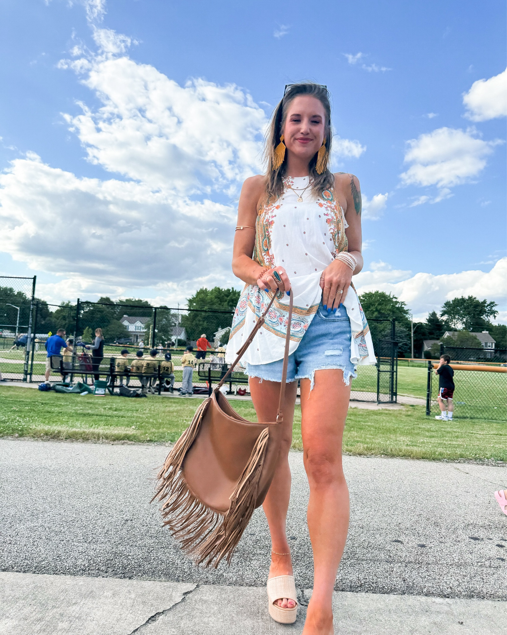 The boys love that I “dress up” for their games  | free people tunic top | aerie pull on shorts from a few years ago-linked others | Target platform sandals 
#summervibes #outfit #look #dressycasual #comfy 

#LTKShoeCrush #LTKStyleTip #LTKSeasonal
