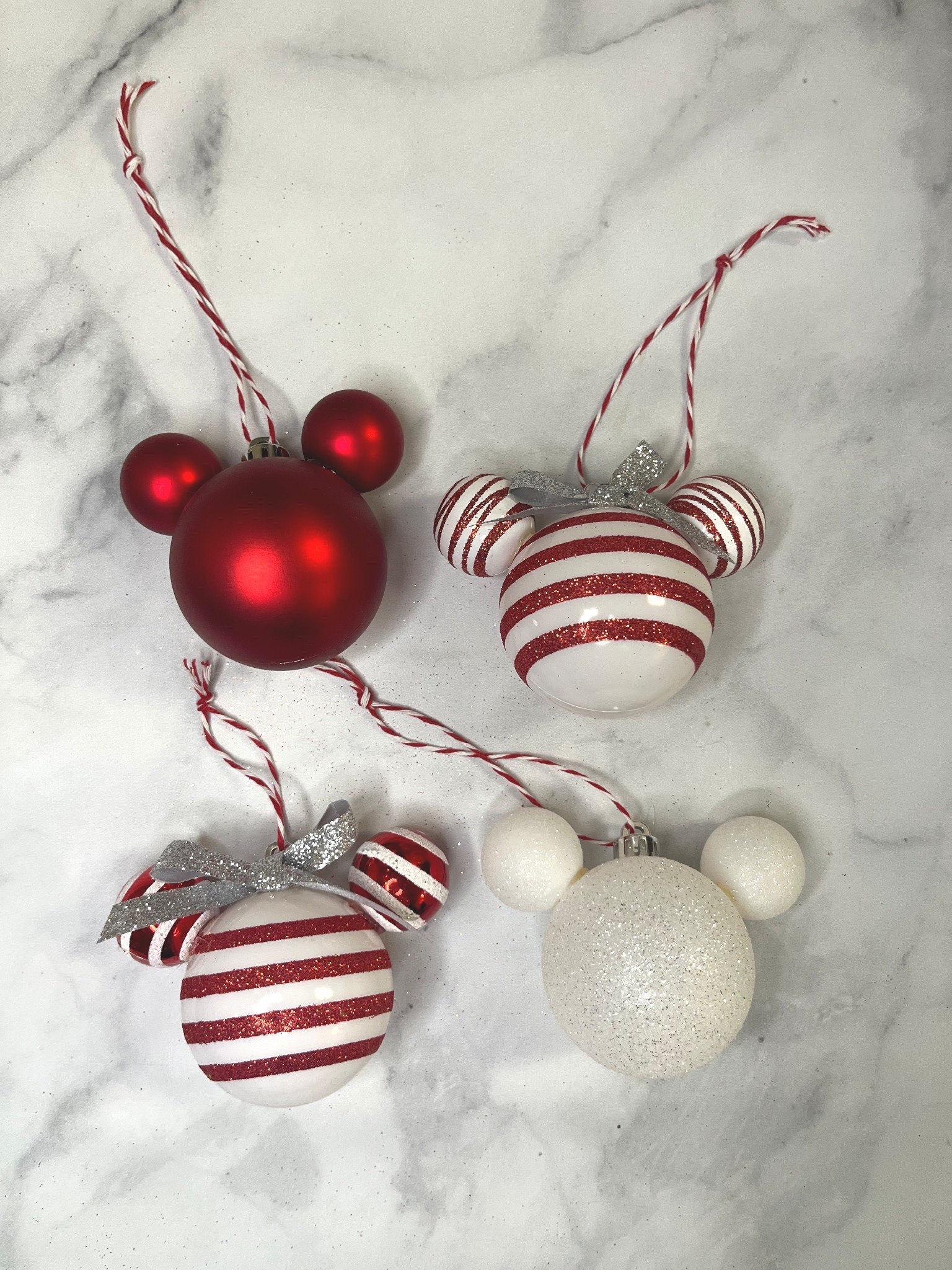 DIY Mickey and Minnie ornaments. This was a fun Disney Christmas craft to do! I used size 60mm ornaments for the heads and size 3cm for the ears  

#LTKHome #LTKHoliday #LTKSeasonal