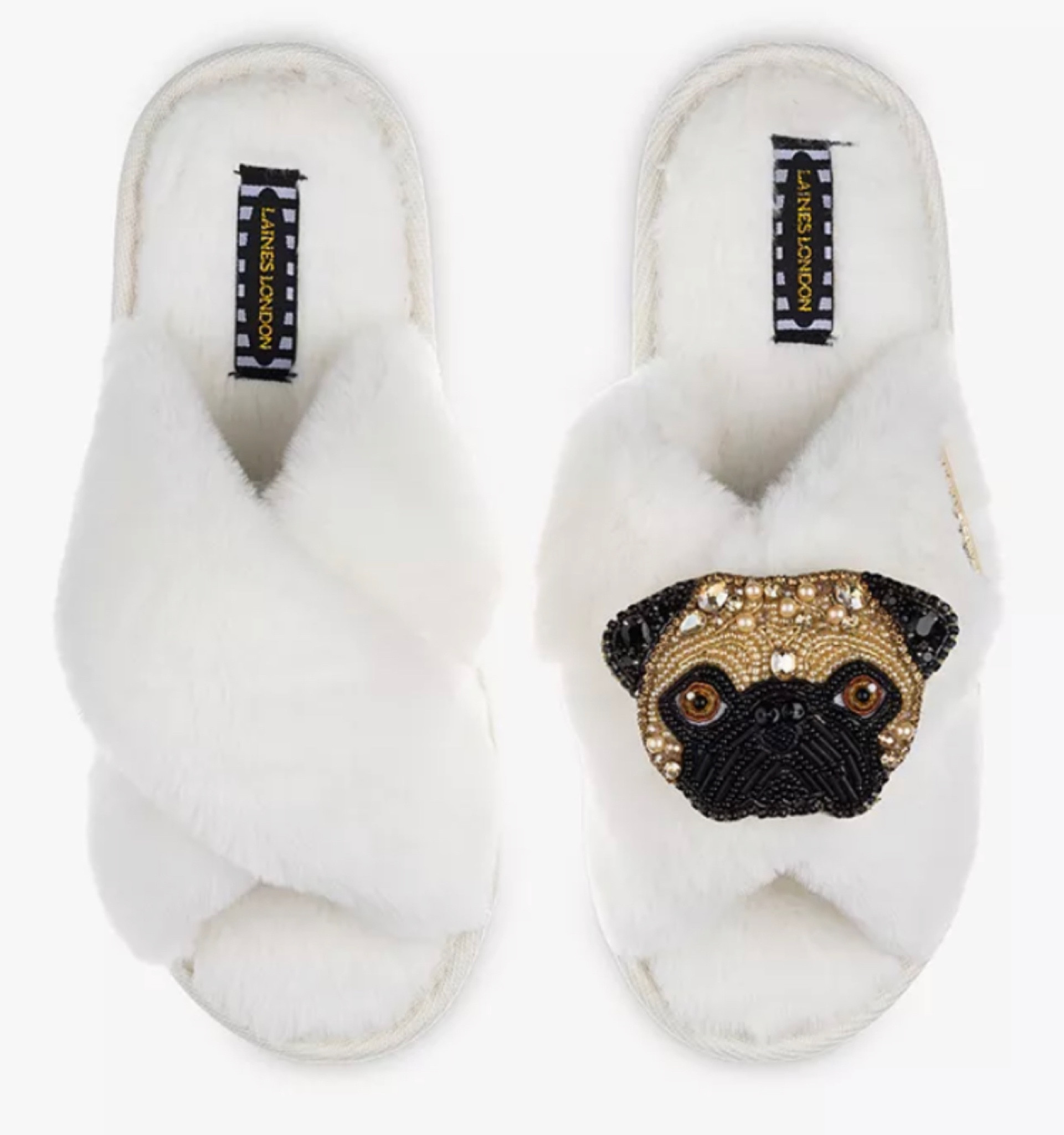 Laines London Classic faux fur slippers (various colours & styles from pugs to corgis to butterflies) 

Treat your feet to these snuggly, fluffy faux fur slippers decorated with a stunning artisan brooch.

Perfect for indoors but also ideal to slip on to nip your local shop for those can't be bothered kinda days, these slippers have a non-slip rubber sole.

The best thing about them, however, is that the brooch can be removed and worn on any items of clothing or your favourite accessories.

Laines London artisan brooches are beautifully hand made with crystal, pearls and beads and each brooch is designed by its in house team and bought to life by its creation team.

Comes complete with a pretty organza bag.

#LTKGiftGuide #LTKstyletip #LTKshoecrush