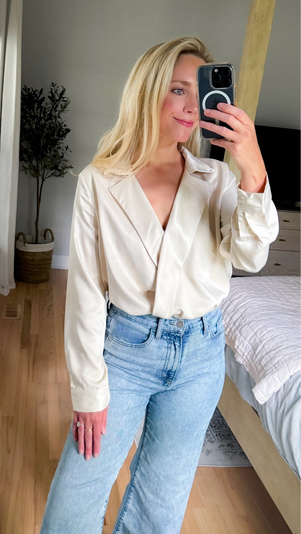 Love this long sleeve satin blouse, wrap shirt, ivory blouse, neutral blouse, cream top, workwear date night outfit office outfit endless rose, wide leg, jeans, Joe jeans light wash denim YSL bag quilted bag neutral bag designer bag Stuart Weitzman sandals neutral heels 