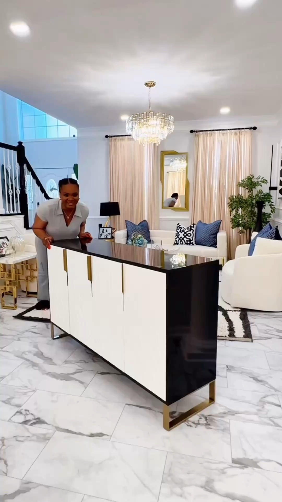 Thinking of elevating an empty wall? Using décor pieces like Wall art, canvas frame, moldings, sconces and even sideboards makes a huge difference.
I love to double my credenza for extra wide walls which helps fill in a lot of the space and give your home an elevated appearance.

#LTKHome #LTKSaleAlert #LTKfitnessgoals