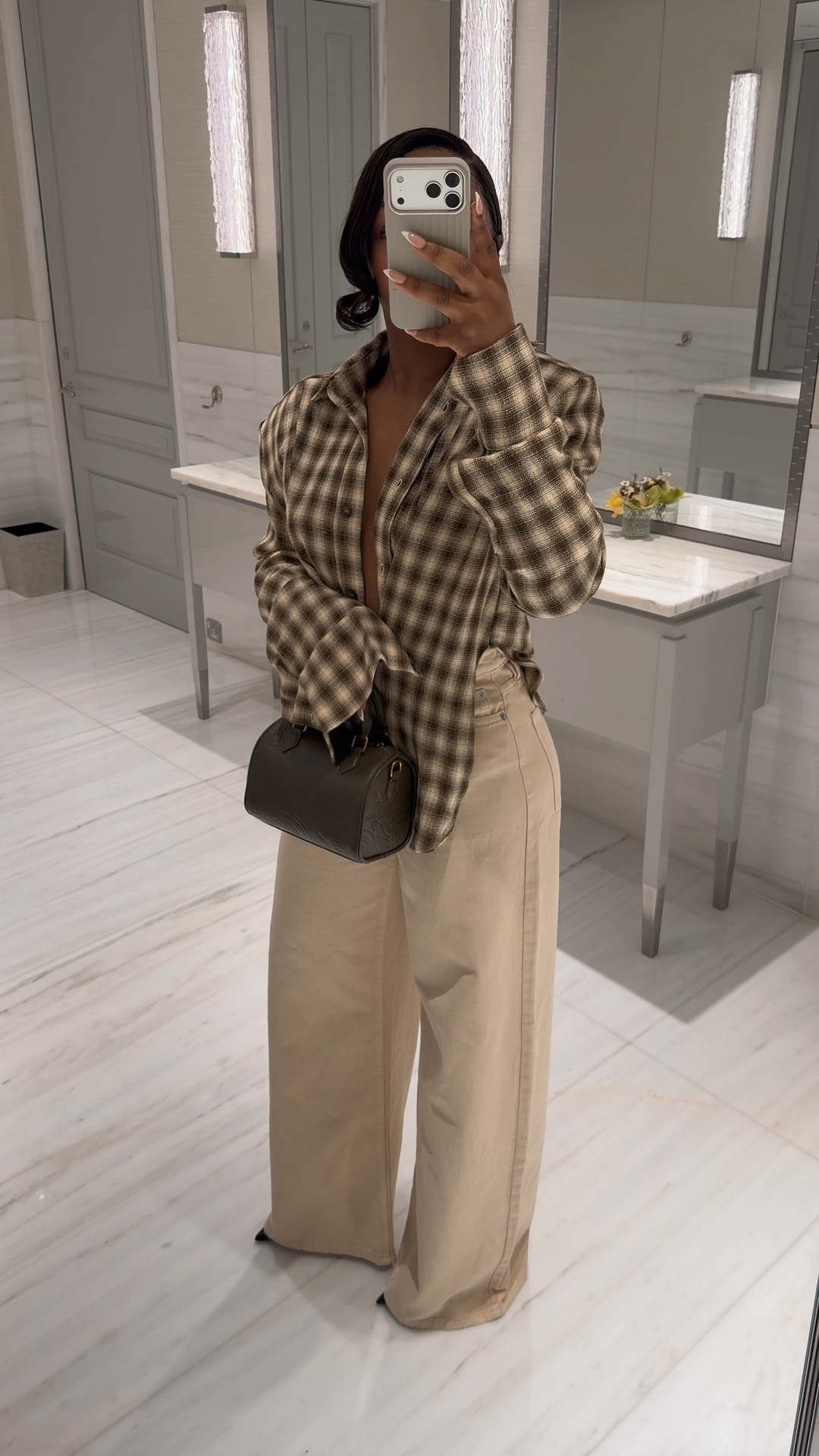 Top: Kwame adusei (alternatives linked below) 
Jeans: Mango 
Bag: ndgparis

Spring outfit, mango jeans 

#LTKstyletip #LTKspring