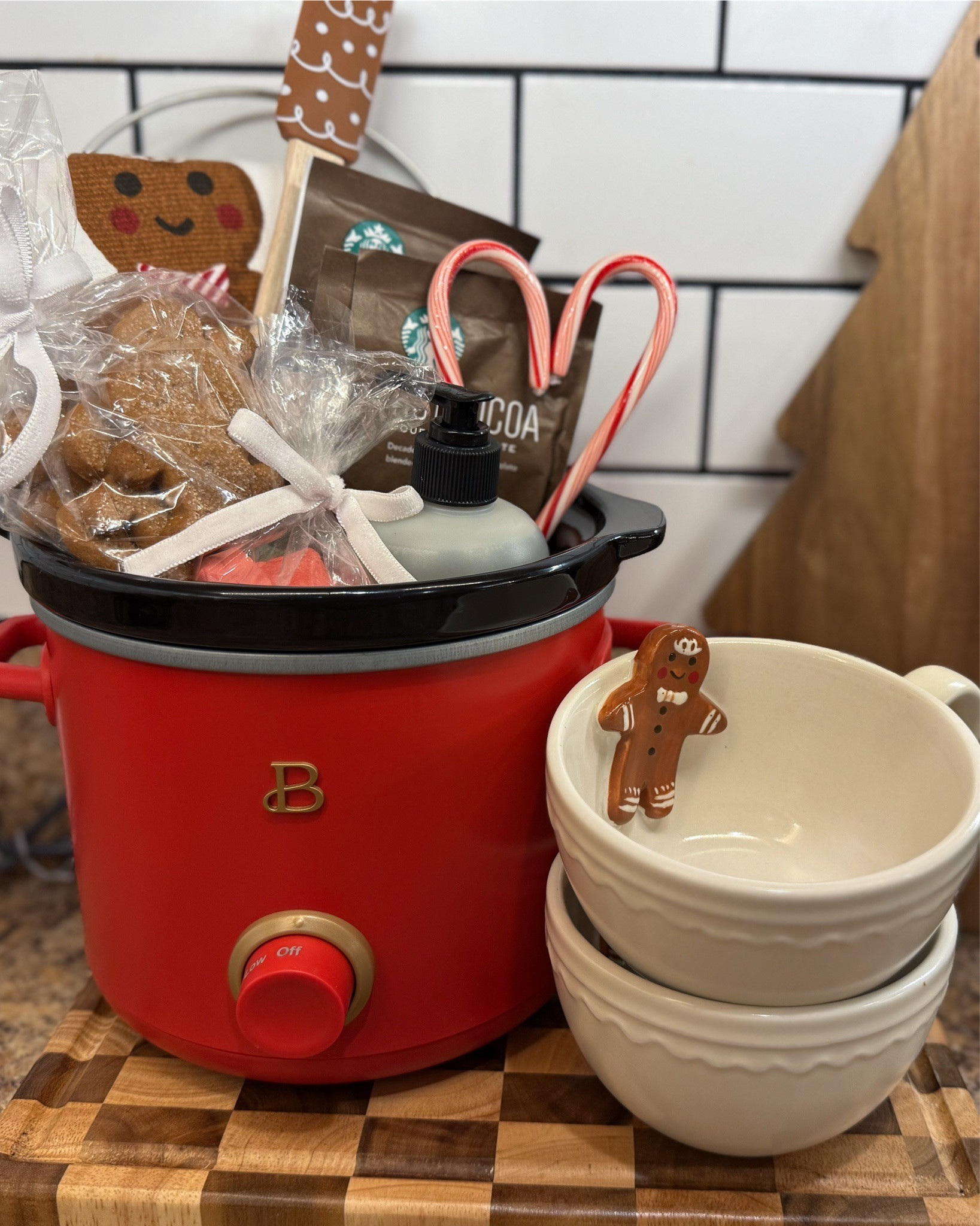 Christmas gift idea for hostess, teachers, friends, white elephant gift etc

Hot cocoa bar gift ideas. Mini crockpot gift. Gingerbread theme Christmas gift. 

You could also just add all of this to a basket instead of the mini crockpot as well!

#LTKHoliday #LTKHome #LTKGiftGuide