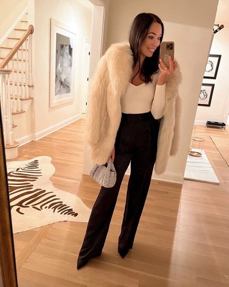 Kat Jamieson wears a holiday outfit. Cocktail party, faux fur coat, fur jacket, silk pants, trousers, festive, Christmas outfit, holidays, formal. 

#LTKSeasonal #LTKHoliday #LTKparties