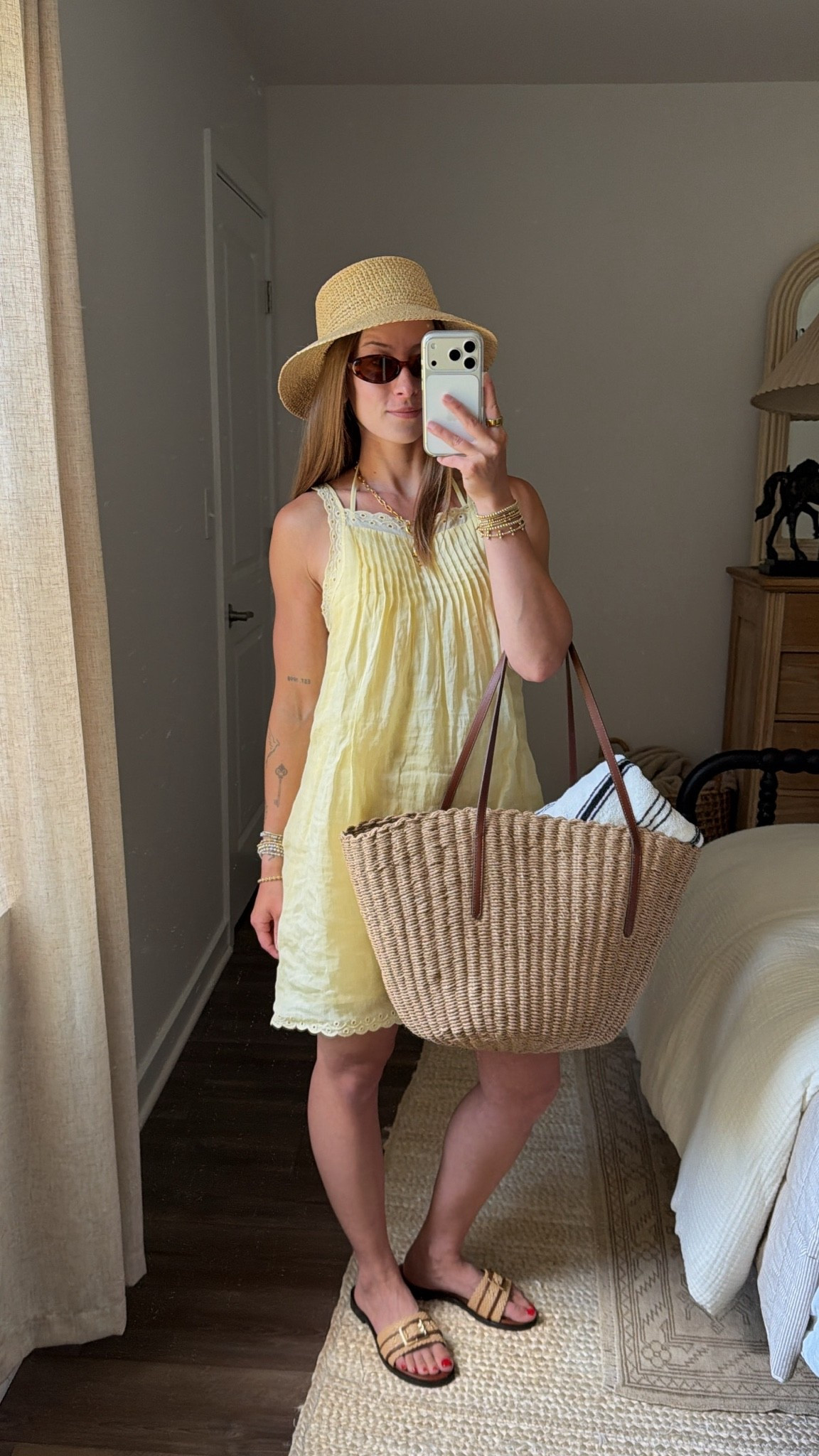 6/25/26 My Versatile Summer J.Crew Favorites @jcrew #ad #injcrew
	
 The kind of pieces that make getting dressed in the summer so easy 🤍 I'm wearing this buttery yellow J.Crew dress in an XS, styled with the cutest fish-inspired jewelry, their everyday slide sandals, and an oversized beach tote. I also linked the matching butter yellow bikini (XS top / S bottoms) that's perfect underneath for beach days. I love how effortlessly this look goes from coffee and exploring a cute town to an afternoon by the water. Everything is linked here ✨

#LTKootd #LTKgrwm #LTKSeasonal
