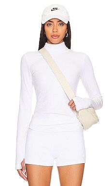 alo Wellness Ribbed Long Sleeve in White from Revolve.com | Revolve Clothing (Global)