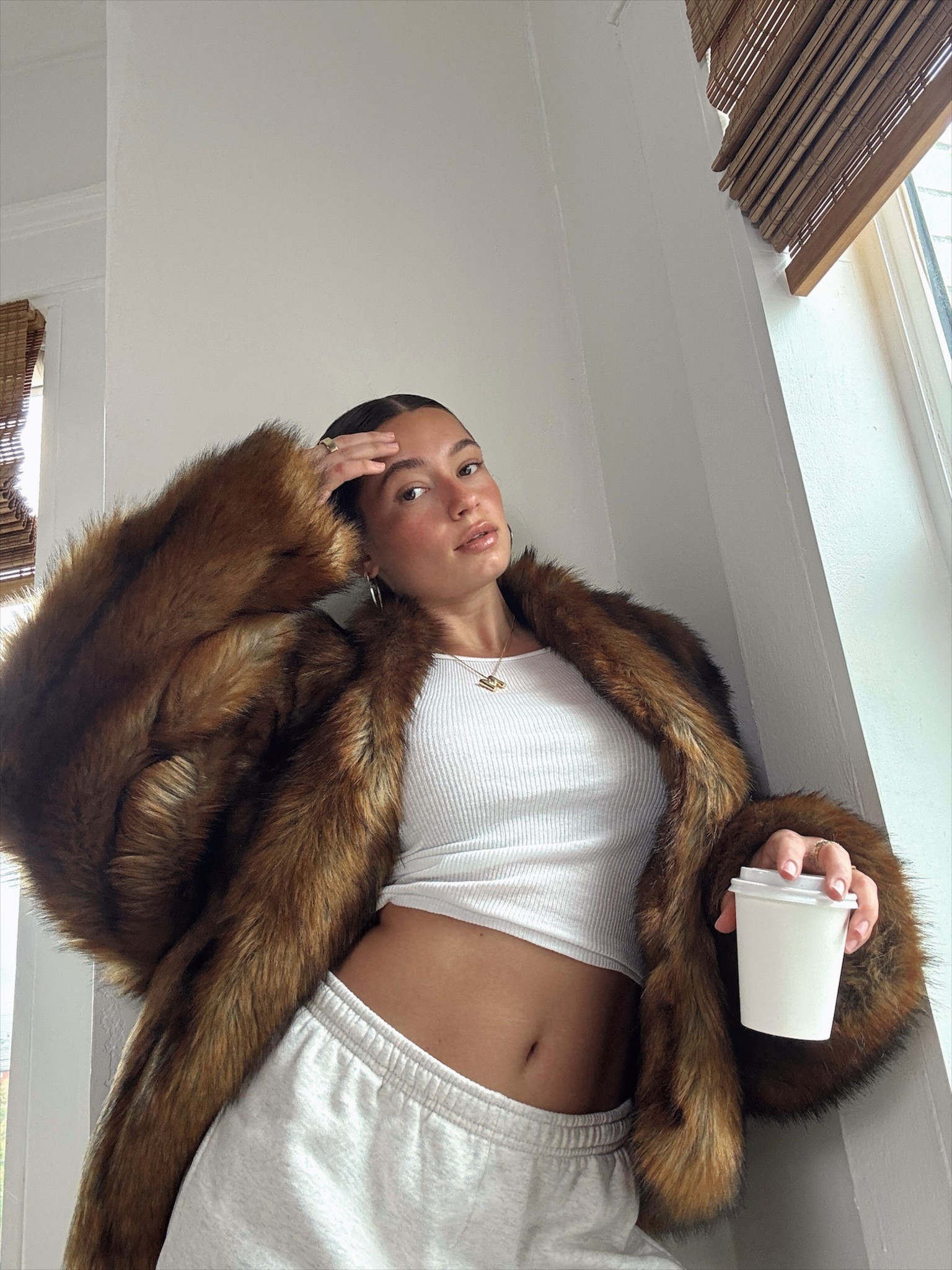 Sweats are brandy, tank is Amazon, coat is KHY 

#LTKWatchNow #LTKStyleTip #LTKItBag