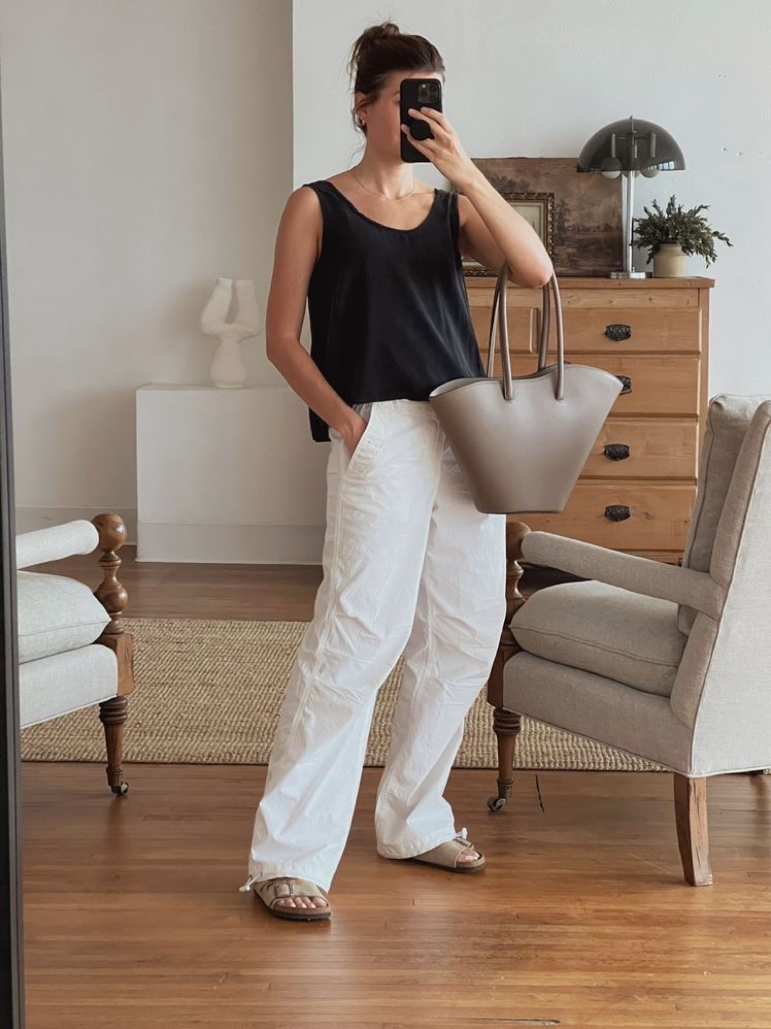 Elevate a pair of parachute pants with a relaxed-fit silk tank and a gorgeous bag.

#LTKitbag #LTKSeasonal #LTKstyletip
