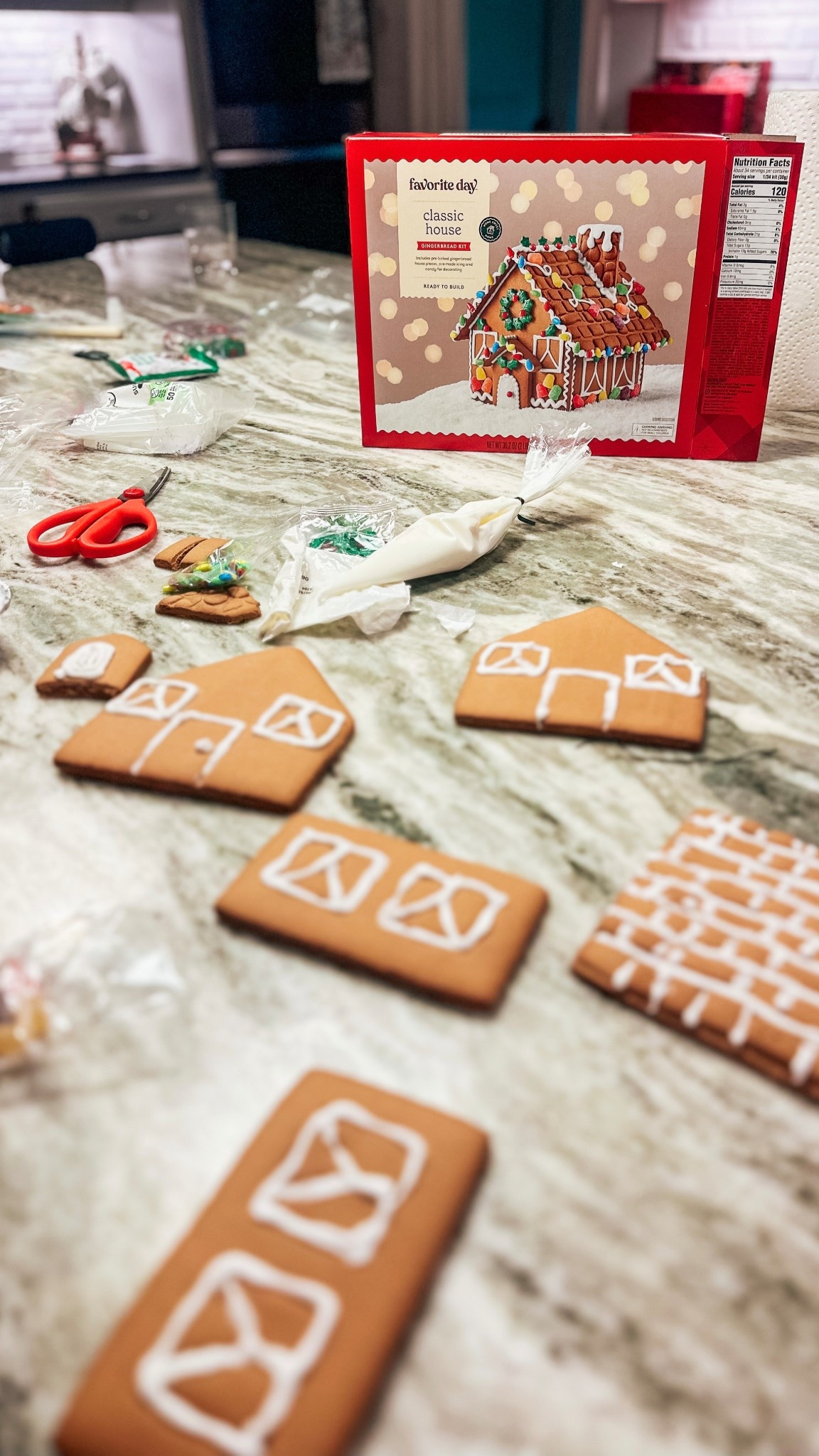 Holiday traditions are my love language ✨ One of my favorites? Gingerbread house night. These Target kits make it so easy. Everything you need is included, just add Christmas music and you’ve got the sweetest family night. 🍬🏠 

#LTKmomlife #LTKHoliday #LTKdayinmylife