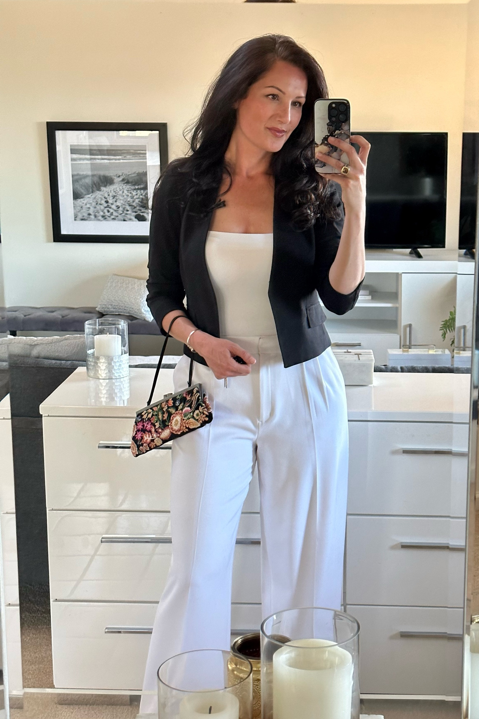 Black and white outfit idea - white bodysuit, white wide leg pants, black blazer, and black purse. 

#LTKstyletip #LTKunder50 #LTKFind
