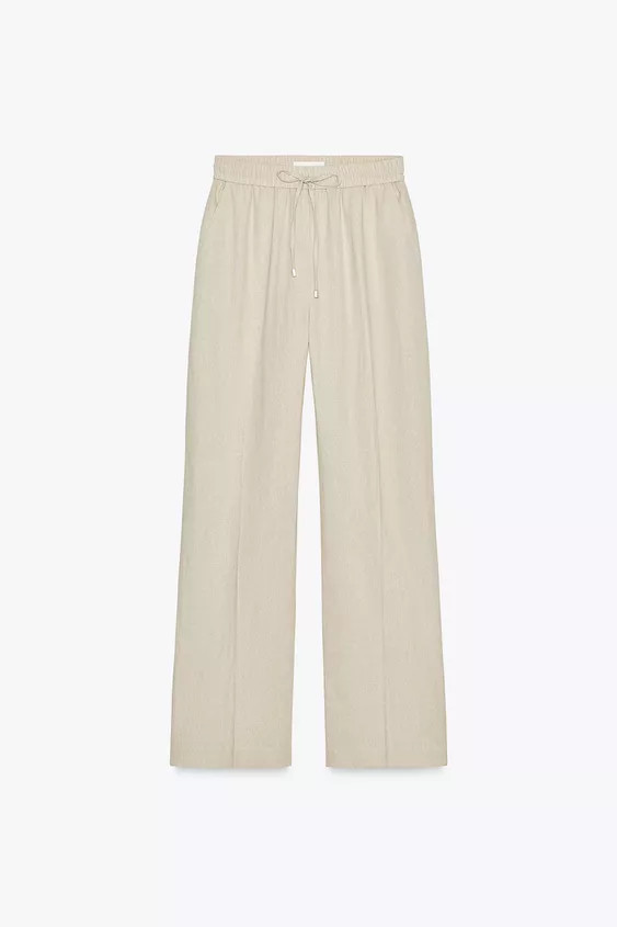 Linen blend pants. High waist with adjustable elastic drawstring waistband. Front pockets. Straig... | Zara US