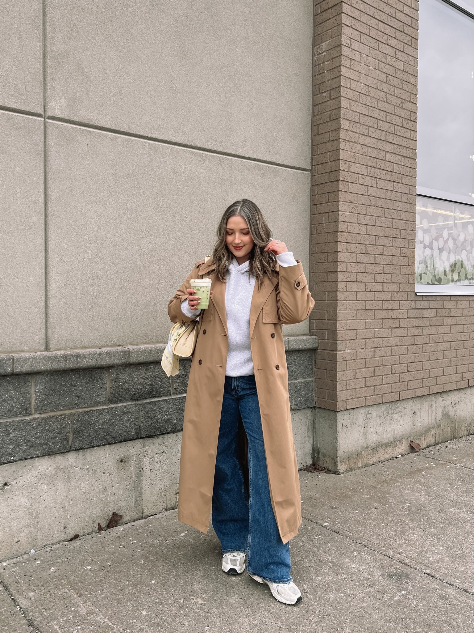 Spring outfit for a chilly day! Code SPRINGAF for extra 15% off at Abercrombie! Wearing my usual size L in the classic water resistant trench coat. Hoodie runs small, sized up to XL. Wearing 32 in the jeans, could have done 31 but I like a looser fit. New Balance sneakers are so comfy but run big, I’m a 9.5-10 and wear a 9. Butter yellow bag and scarf are Old Navy, Canadian links under similar products.


#LTKjeans #LTKsale #LTKmidsize