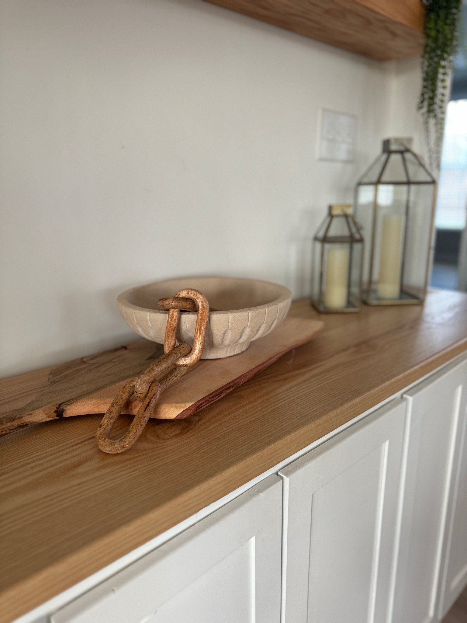 How I styled my bowl from target I snagged the other day 

Layering is key! 

Lanterns are from Amazon 
Wooden tray is homemade but they have all sorts places 
Chain is from hobby lobby 

#LTKSeasonal #LTKhome #LTKfindsunder50